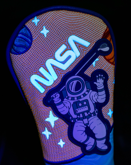 NASA Space Walk hybrid golf cover featuring a vibrant astronaut design and cosmic elements, perfect for standout style on the course.