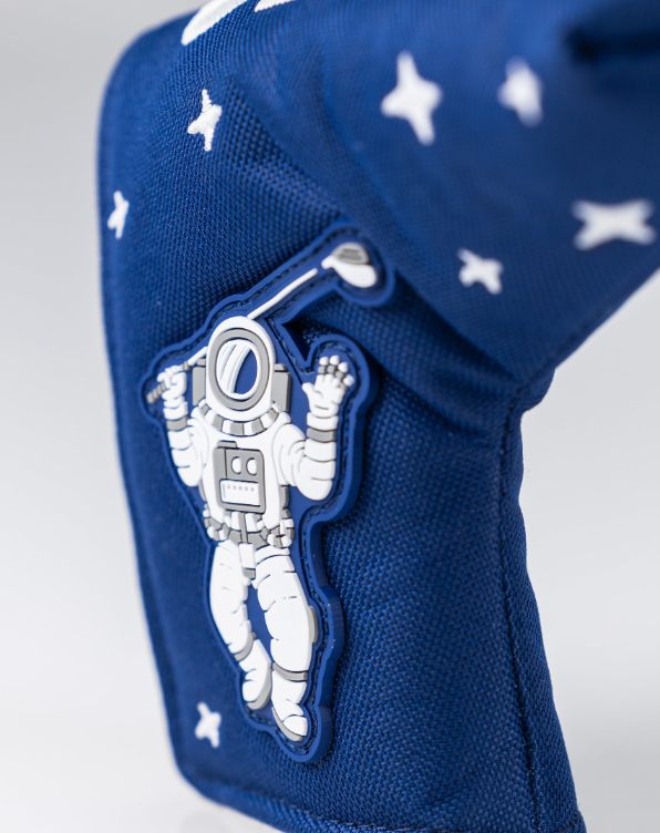 NASA Space Walk blade putter cover featuring an astronaut graphic and star pattern on a blue background.