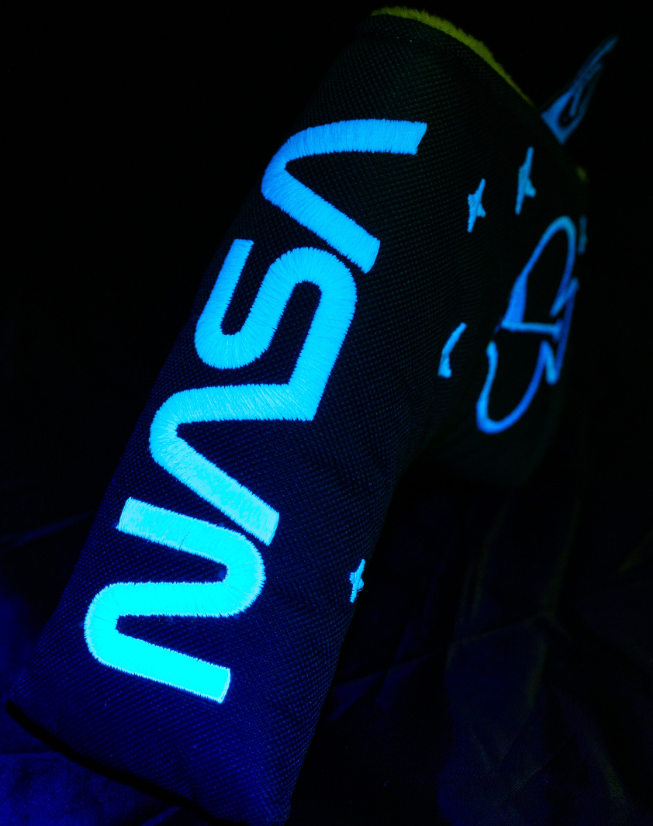 NASA Space Walk Blade Putter Cover featuring glowing blue lettering and star designs, perfect for bold golfers.