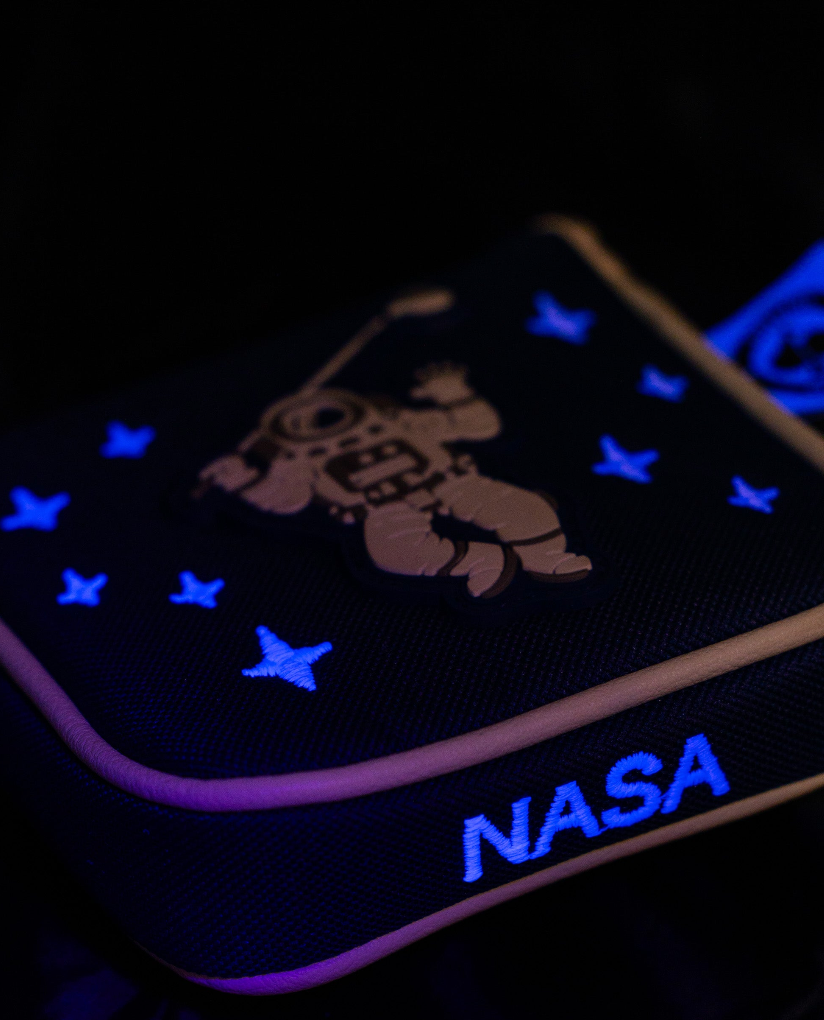 NASA Space Walk mallet putter cover featuring an astronaut design with glowing stars and the NASA logo.