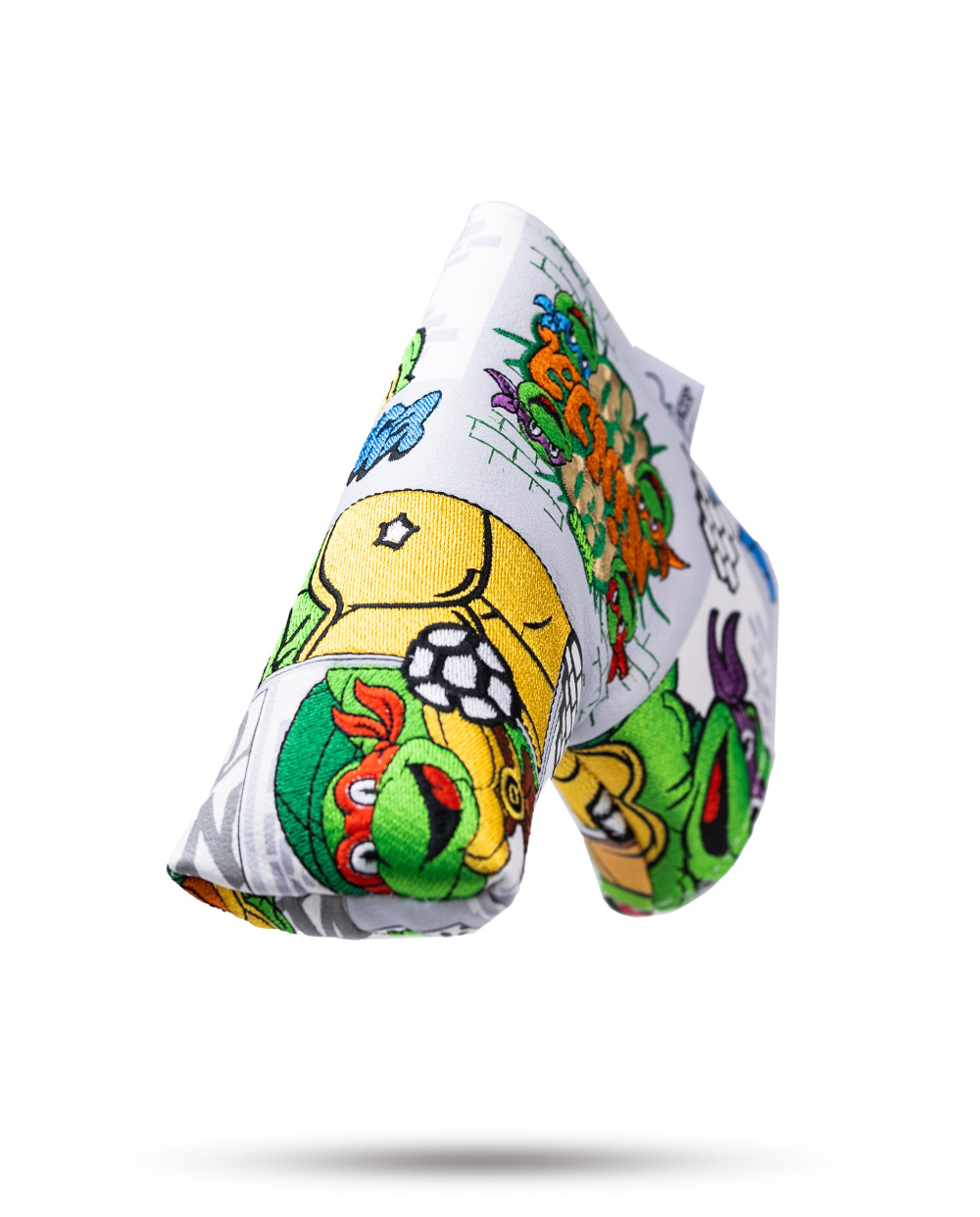 Colorful TMNT comic blade cover featuring vibrant illustrations of the Teenage Mutant Ninja Turtles and their adventures.