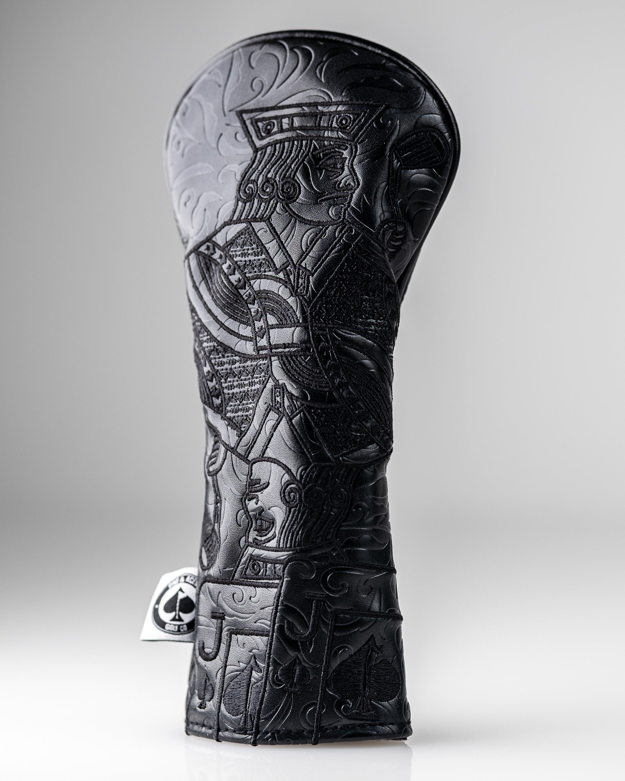 Blackout Jack of Spades hybrid cover featuring intricate embossed designs, perfect for stylish golfers seeking uniqueness.