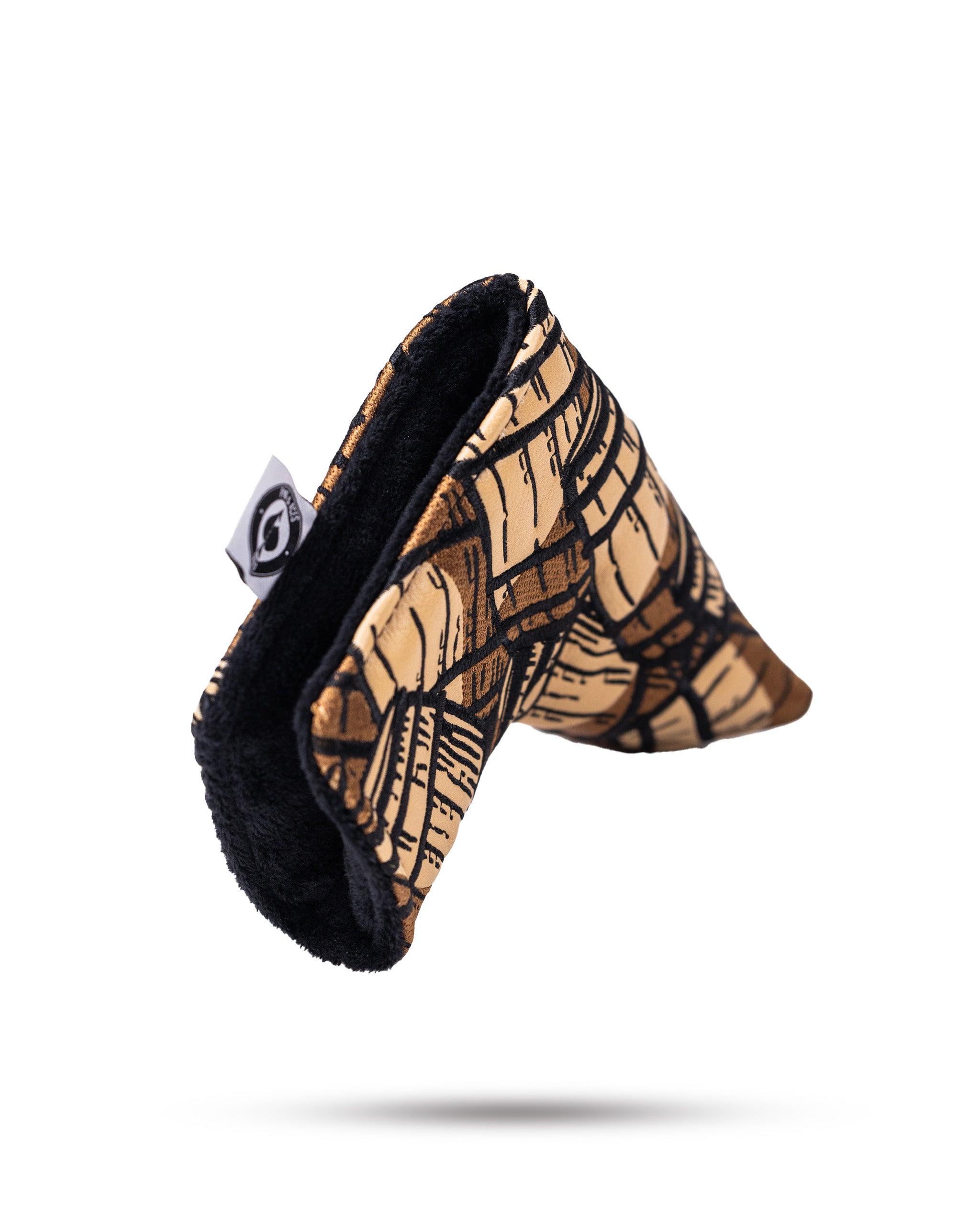 Bourbon Barrel Blade Putter Cover featuring a unique wood grain design, crafted for stylish protection on the golf course.