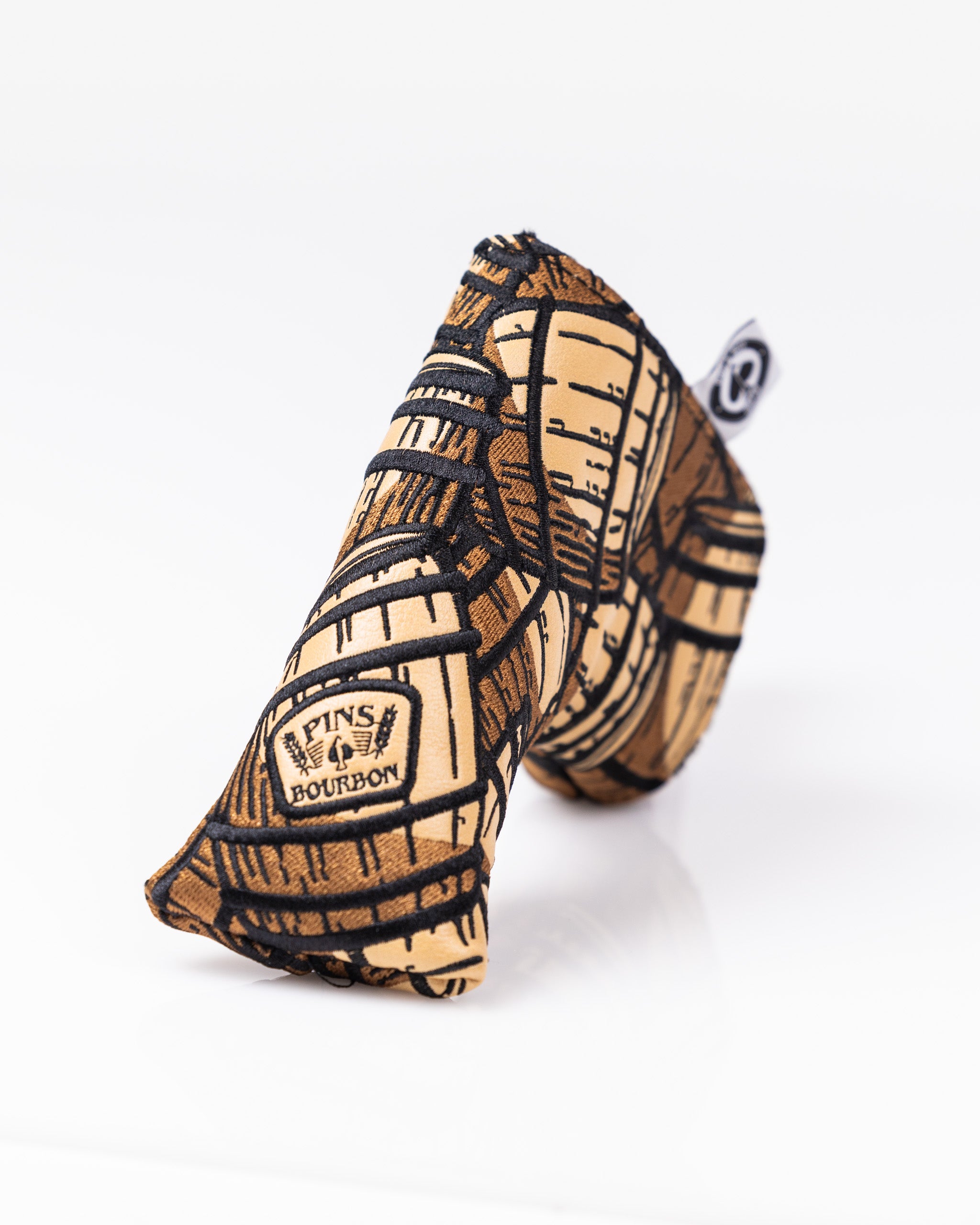 Bourbon Barrel Blade Putter Cover featuring a unique barrel design, perfect for golfers seeking standout accessories.