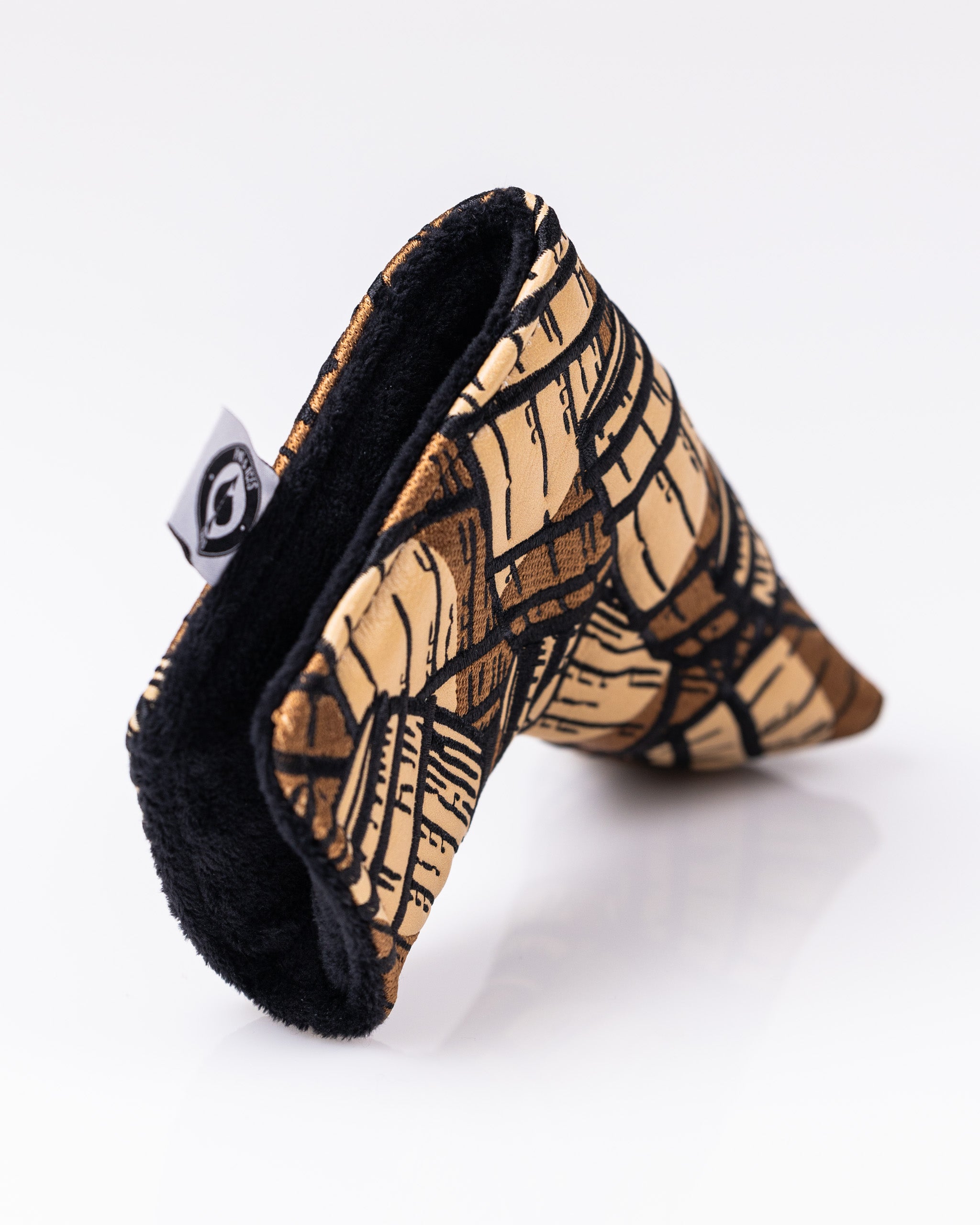 Bourbon Barrel Blade Putter Cover featuring a unique barrel design, crafted for stylish protection on the golf course.