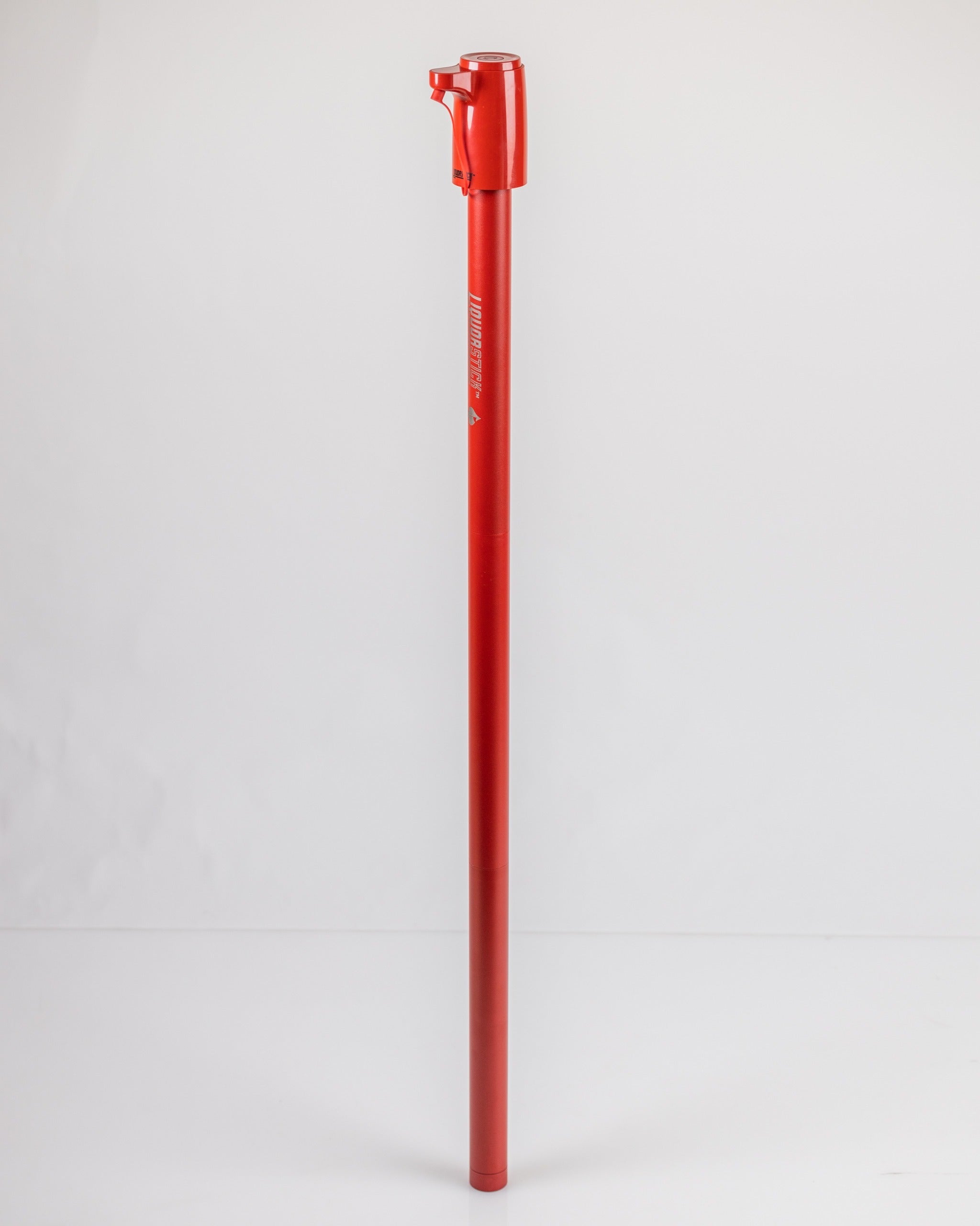 Alt text: Red LiquorStick® 2.0 for easy beverage mixing and serving.