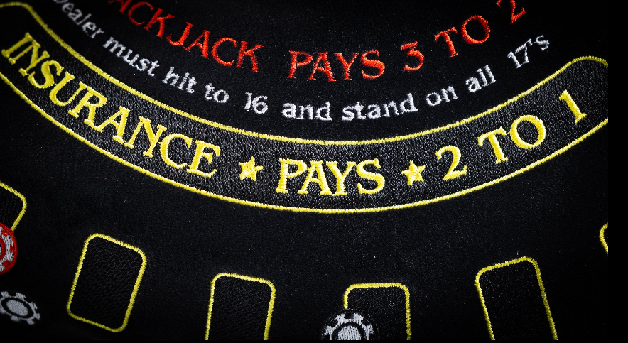 Blackjack driver cover featuring vibrant embroidery of game rules and payouts, perfect for stylish golfers.