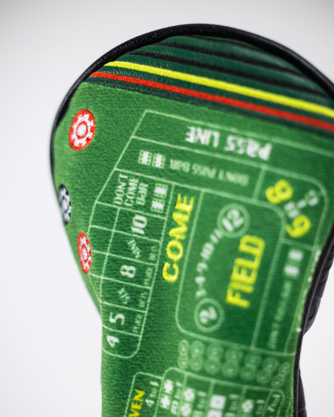 Bold hybrid golf headcover featuring a vibrant craps table design, perfect for golfers looking to stand out on the course.