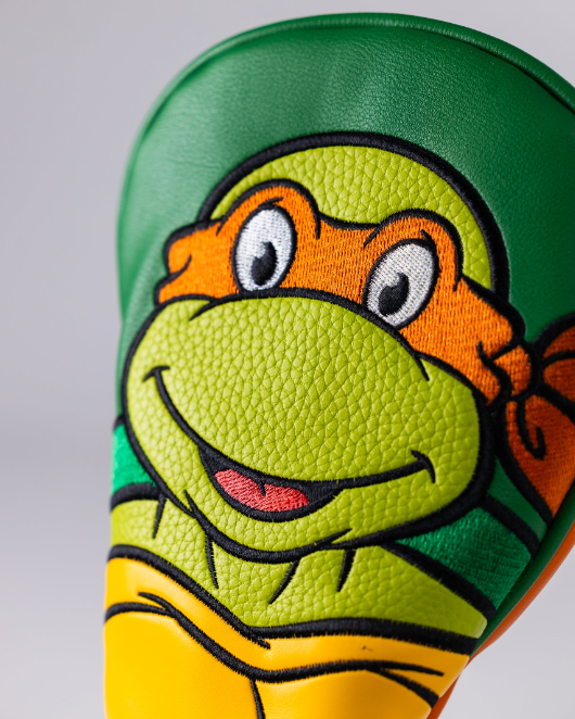 Michelangelo fairway cover featuring vibrant colors and detailed facial design, perfect for TMNT fans on the golf course.