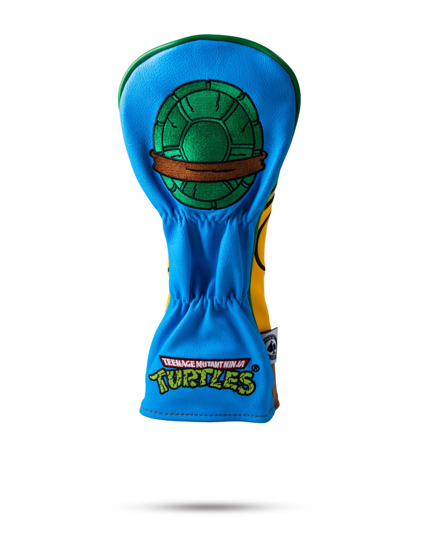 TMNT Leonardo fairway cover featuring vibrant blue and yellow design with a turtle shell graphic, perfect for golf enthusiasts.