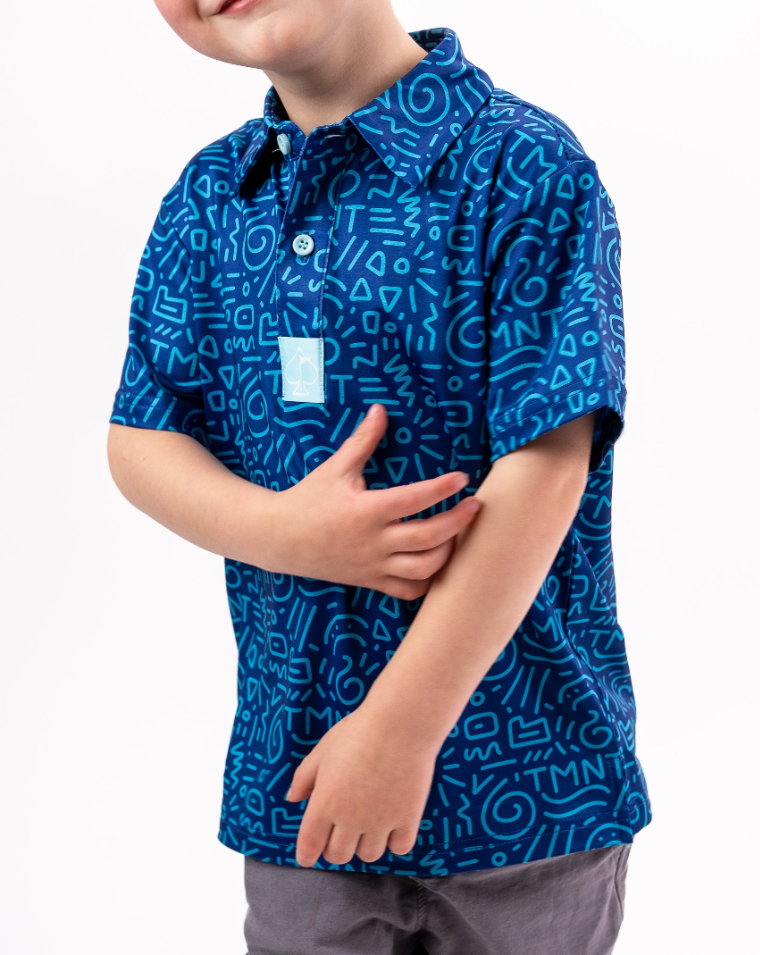 Youth polo shirt featuring a vibrant blue color with playful doodle patterns, perfect for young fans of TMNT.