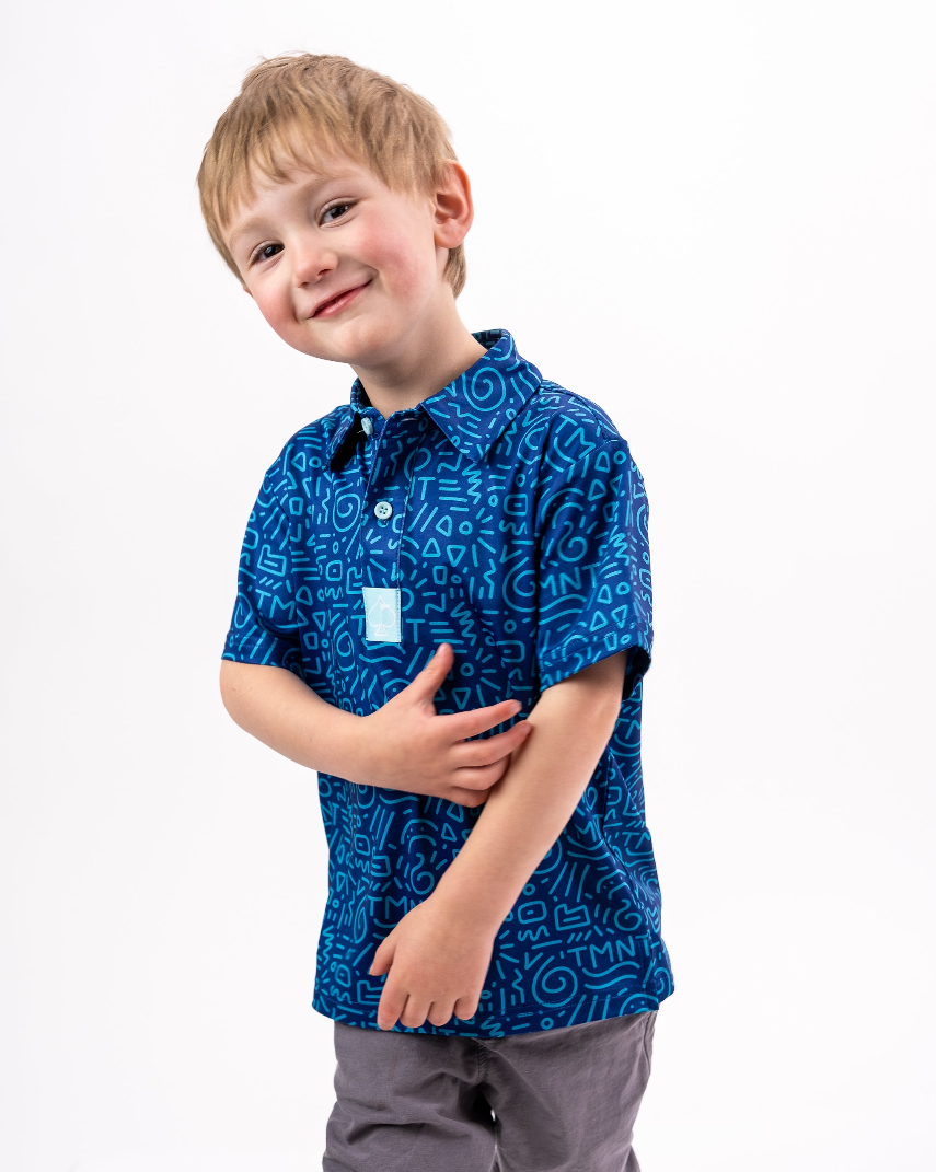 Youth TMNT Doodle shirt featuring a vibrant blue pattern with playful doodles, perfect for young fans of the series.