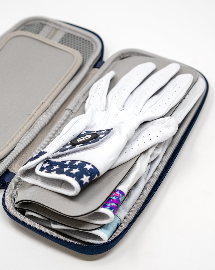 Navy glove and accessory caddie featuring multiple compartments, neatly storing golf gloves and accessories.