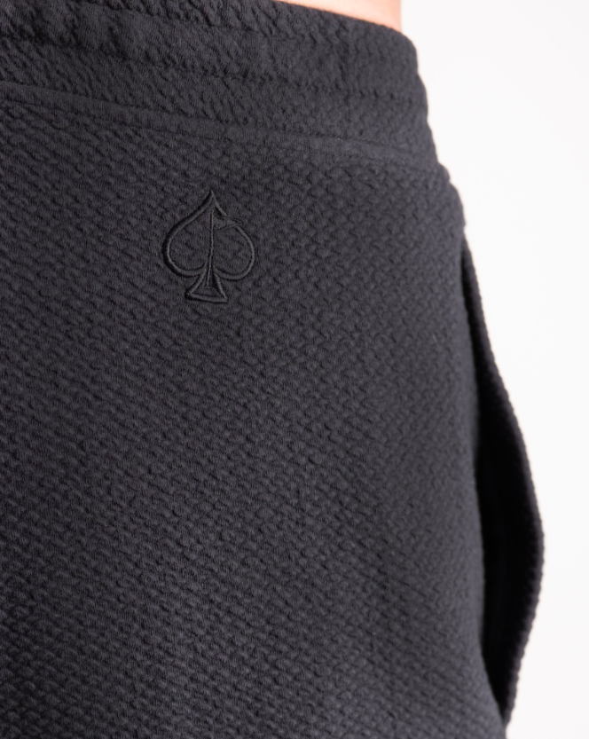 Player Preferred Waffleknit Shorts in Obsidian featuring a textured fabric and subtle logo detail for stylish comfort on the course.