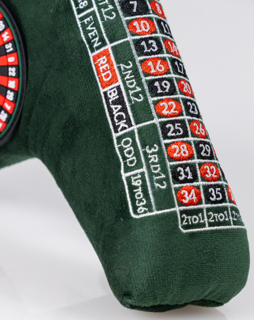 Roulette-themed blade putter cover featuring vibrant colors and a detailed casino layout for stylish golf protection.