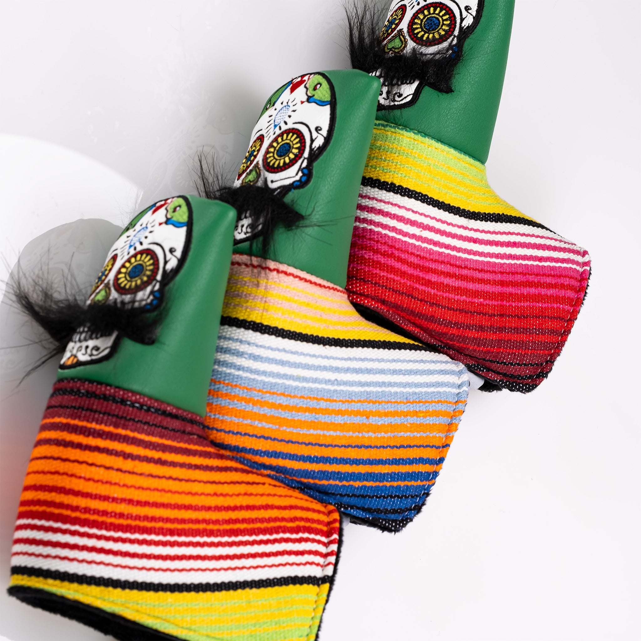 Green Mustache Sugar Skull Blade Putter Cover featuring intricate designs, ideal for golf enthusiasts.