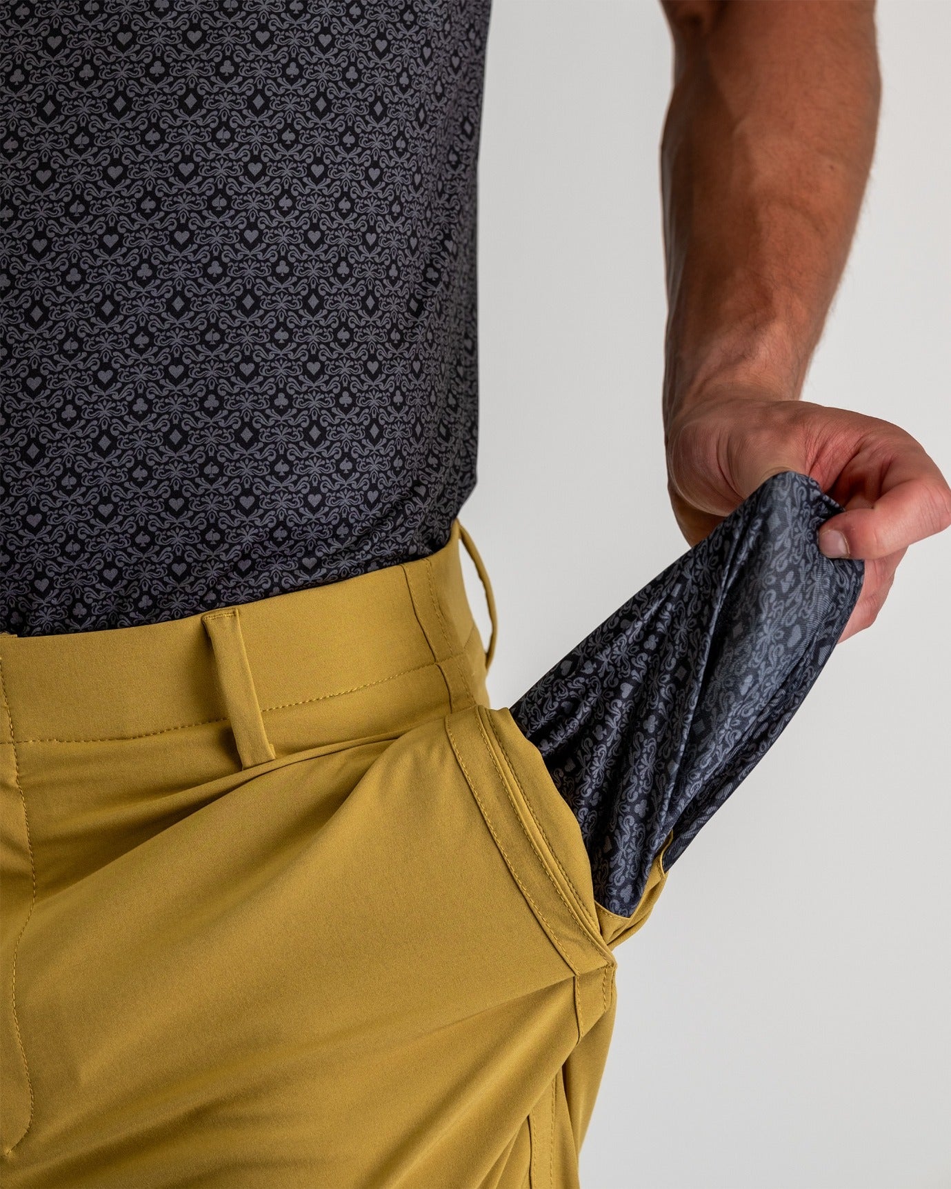 Performance Shorts in Dune color, featuring a lightweight, breathable fabric and an adjustable waistband for optimal comfort and mobility.