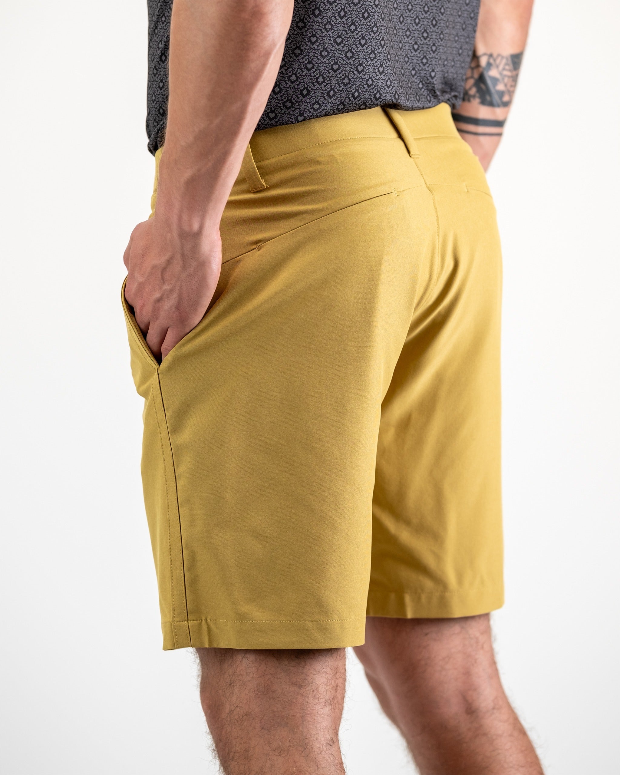 Performance shorts in dune color, showcasing a lightweight fabric and athletic fit, ideal for workouts and outdoor activities.