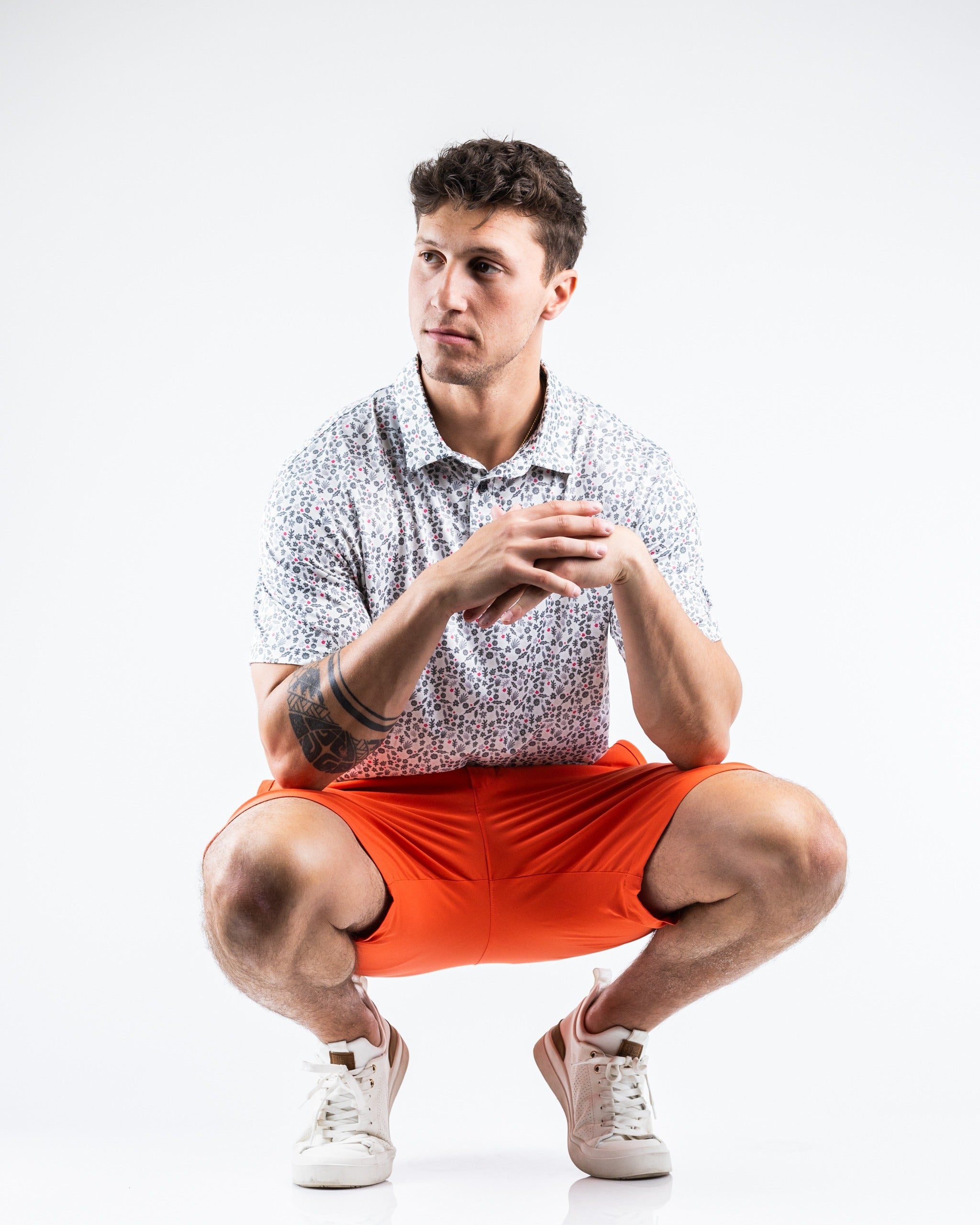 Performance shorts in melon color, featuring a lightweight and breathable fabric, designed for active wear.