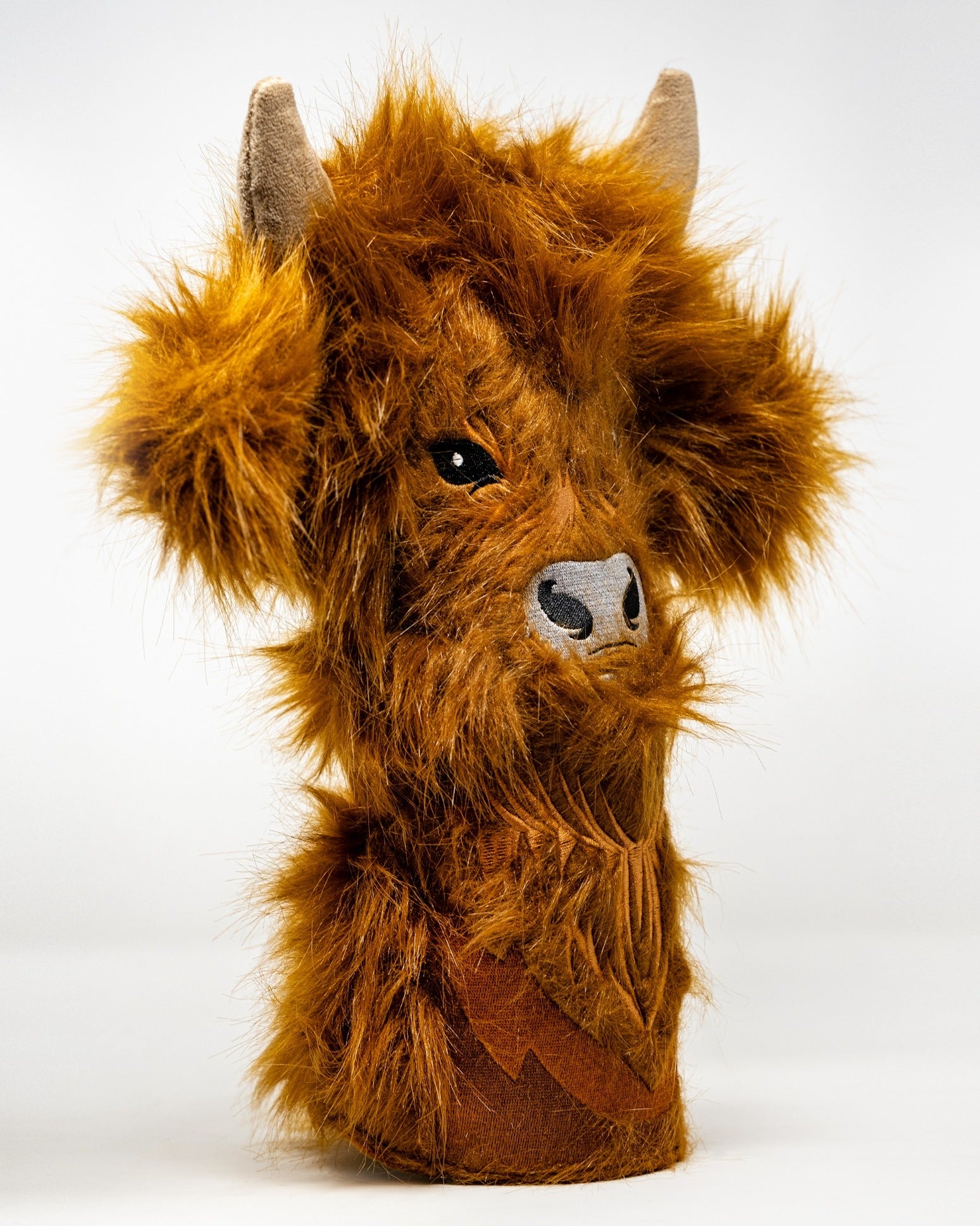 Highland cow driver cover with fluffy orange fur and detailed facial features, designed to add personality to golf clubs.