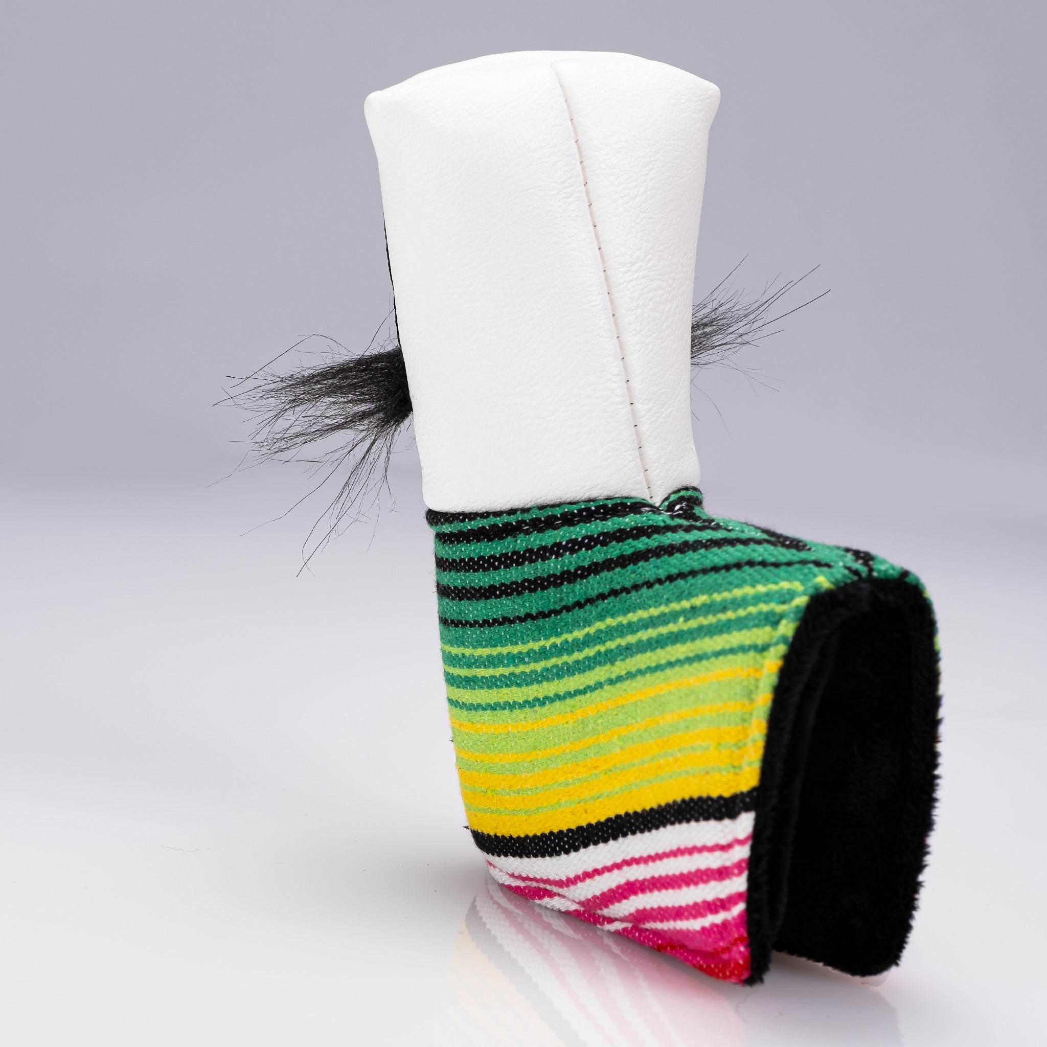 Bold white blade putter cover featuring a colorful striped design and a mustache sugar skull motif for standout style on the course.