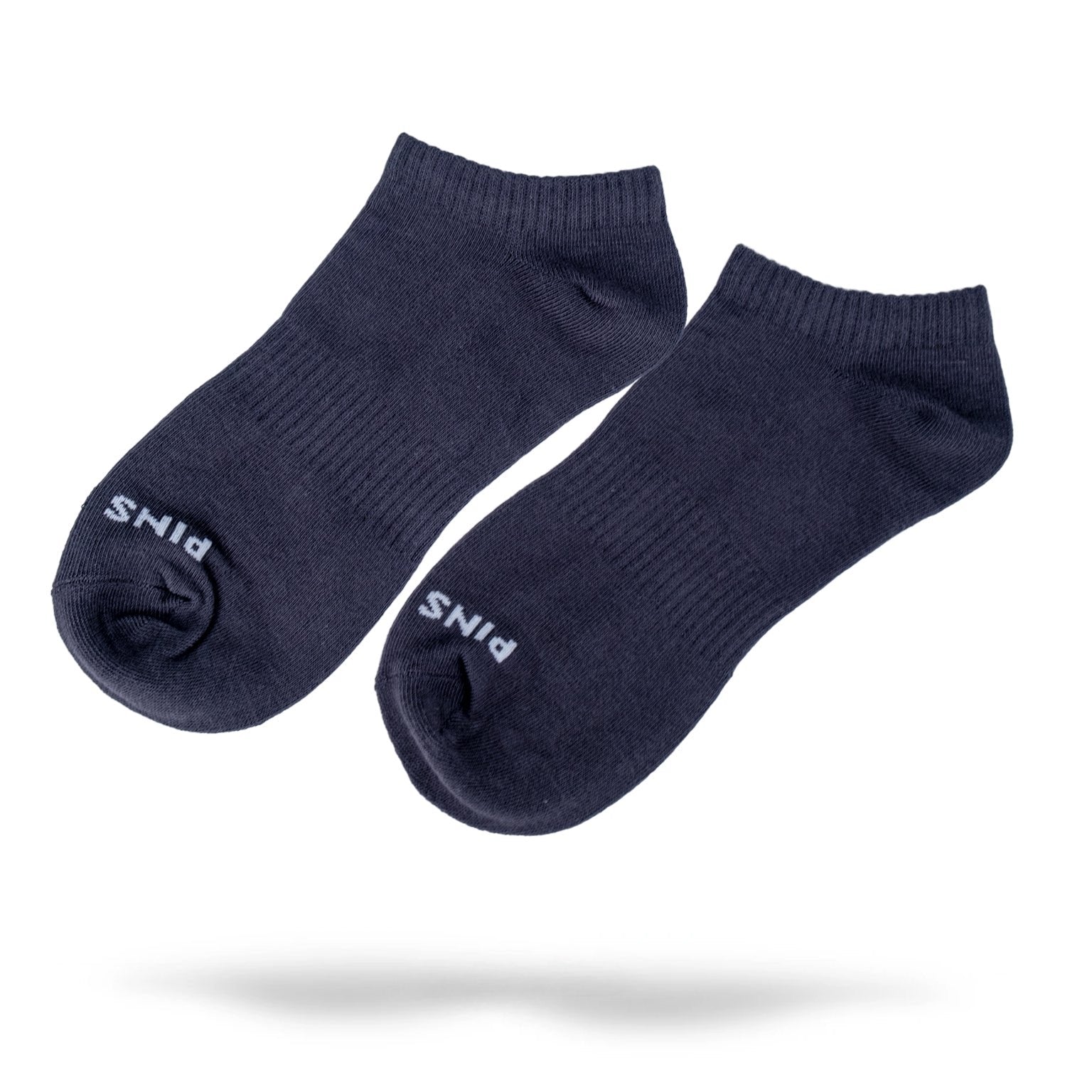 Gray ankle socks featuring the Pins logo, designed for comfort and style on and off the golf course.