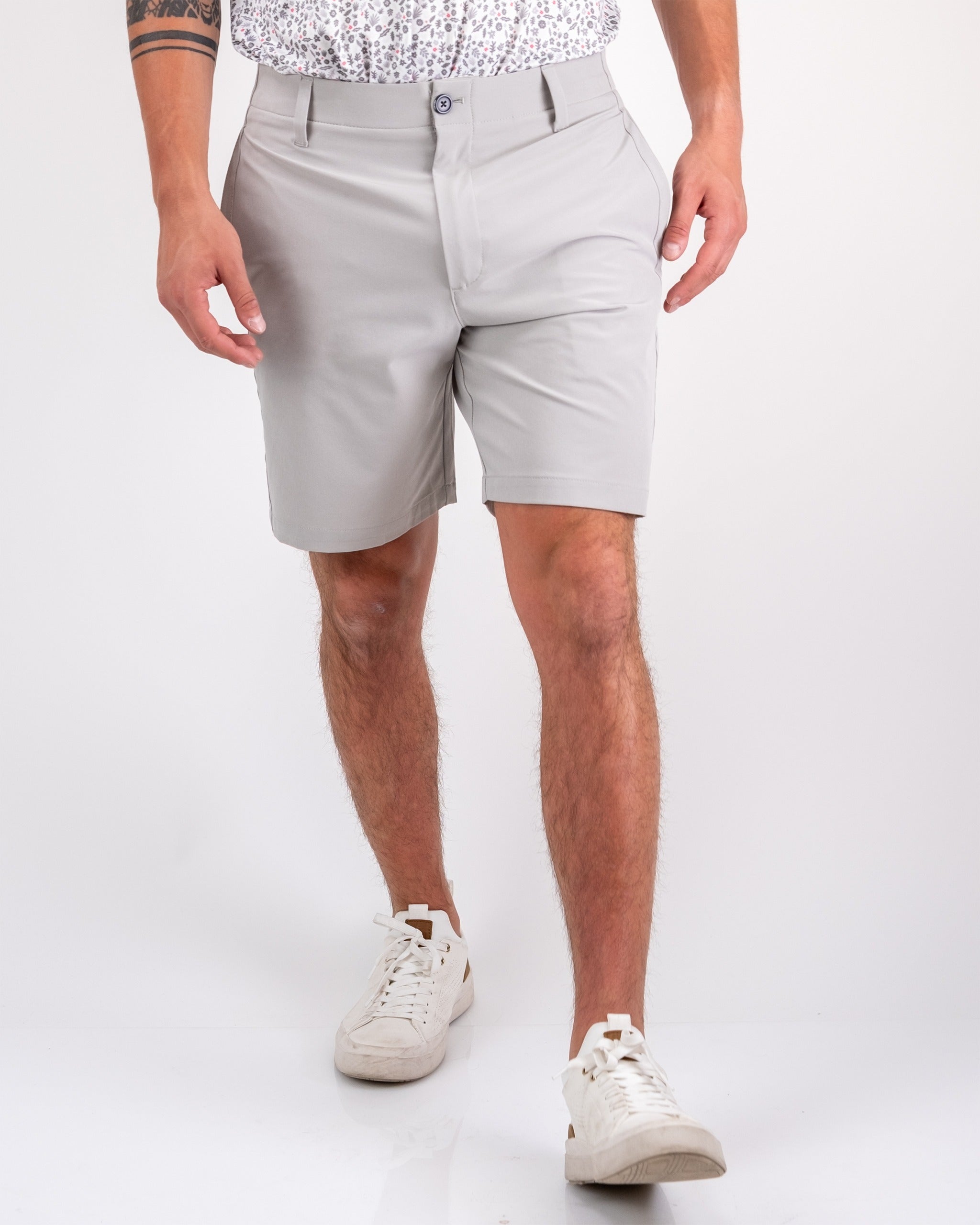 Men's performance shorts in dark stone color, featuring a tailored fit and lightweight fabric, perfect for golfing.