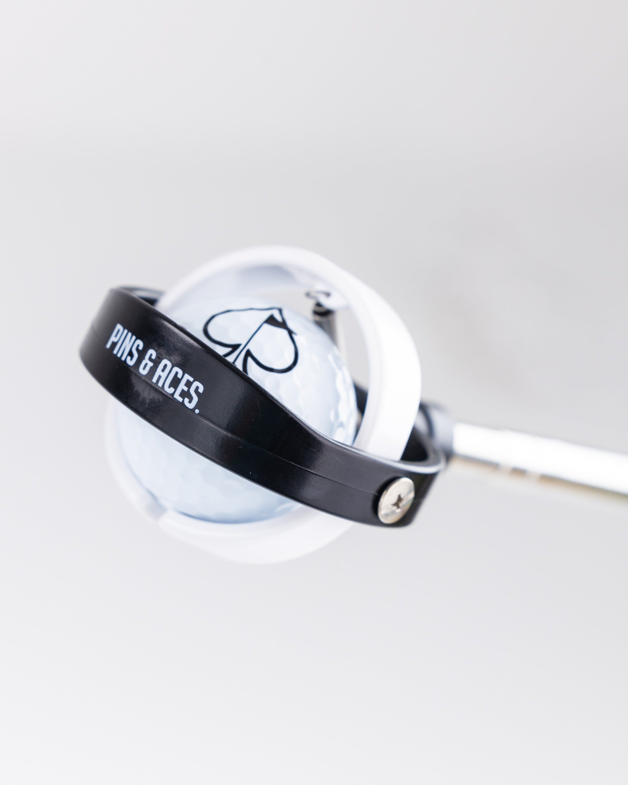 14-foot ball retriever with a sleek design, featuring a secure grip and a logo, ideal for golfers to easily retrieve lost balls.