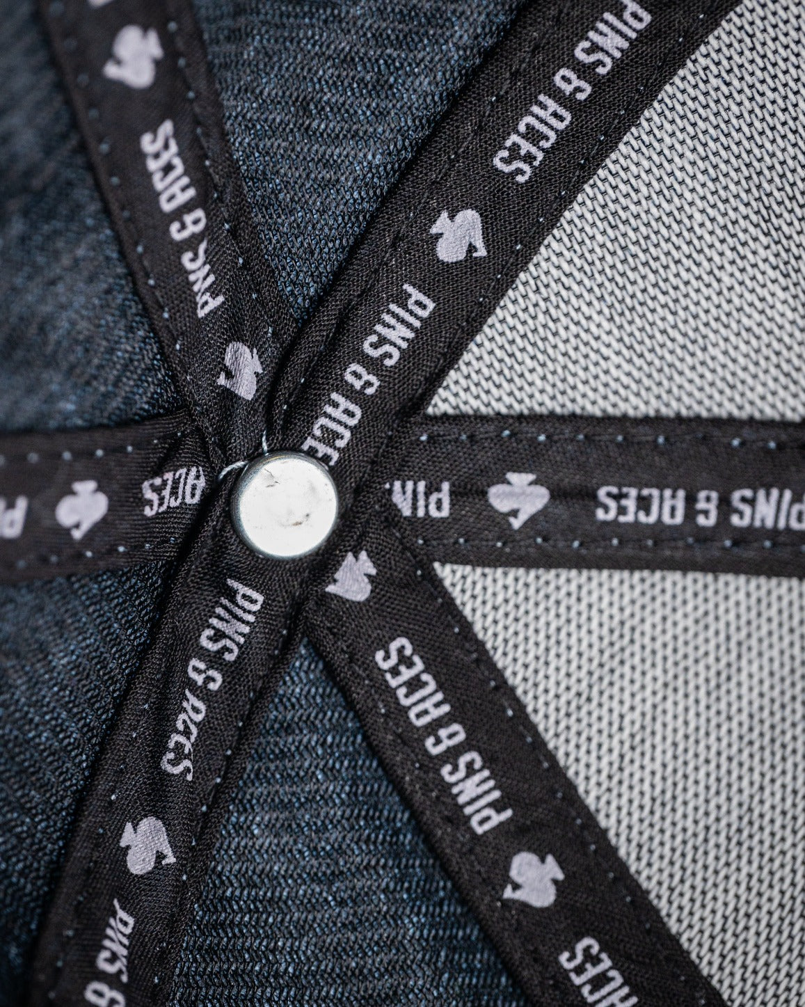 Carolina Blue Performance Spade Hat featuring a unique design and Pins & Aces branding for stylish golfers.