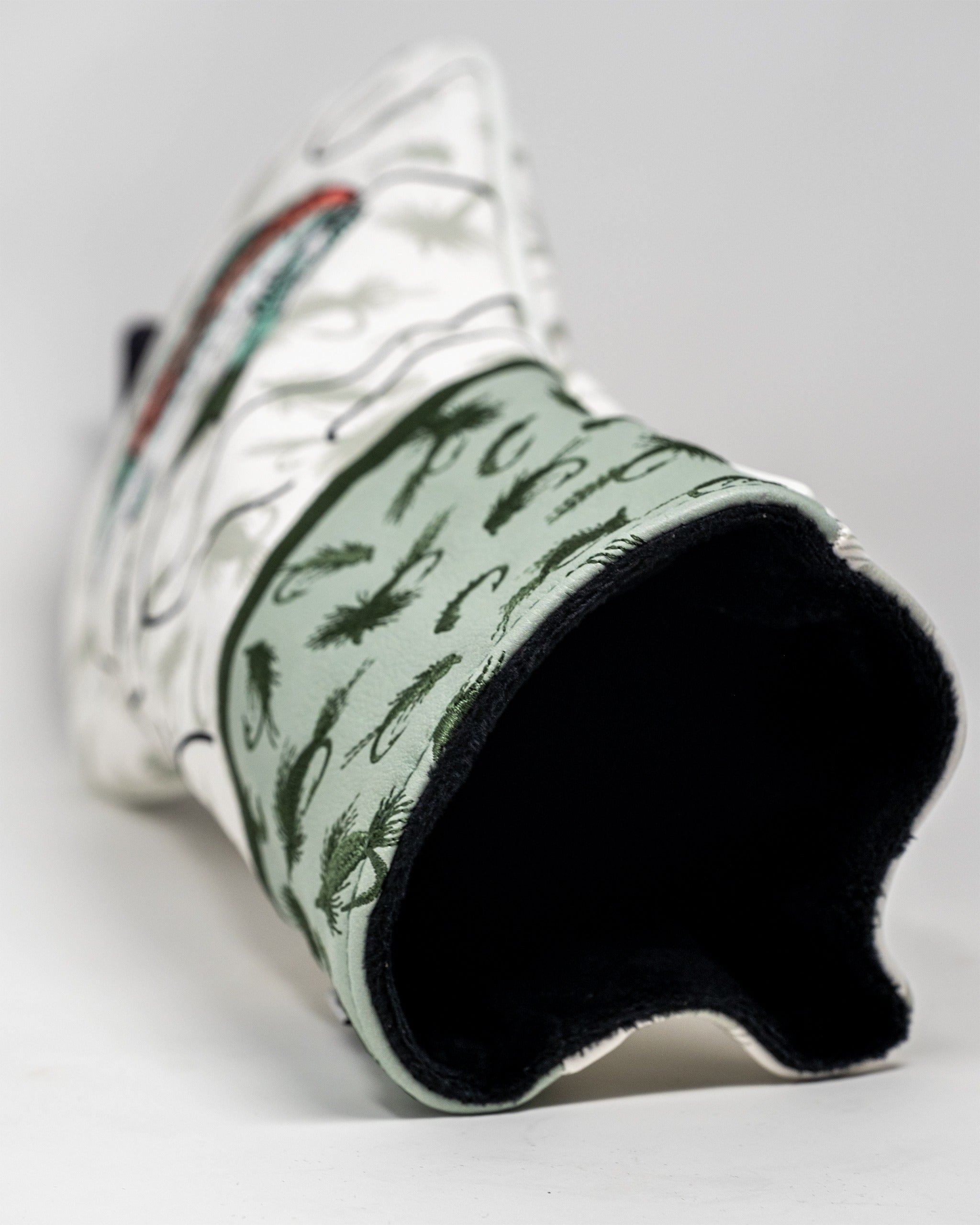 Trout driver cover featuring a unique fish design with a green interior, perfect for stylish golfers.