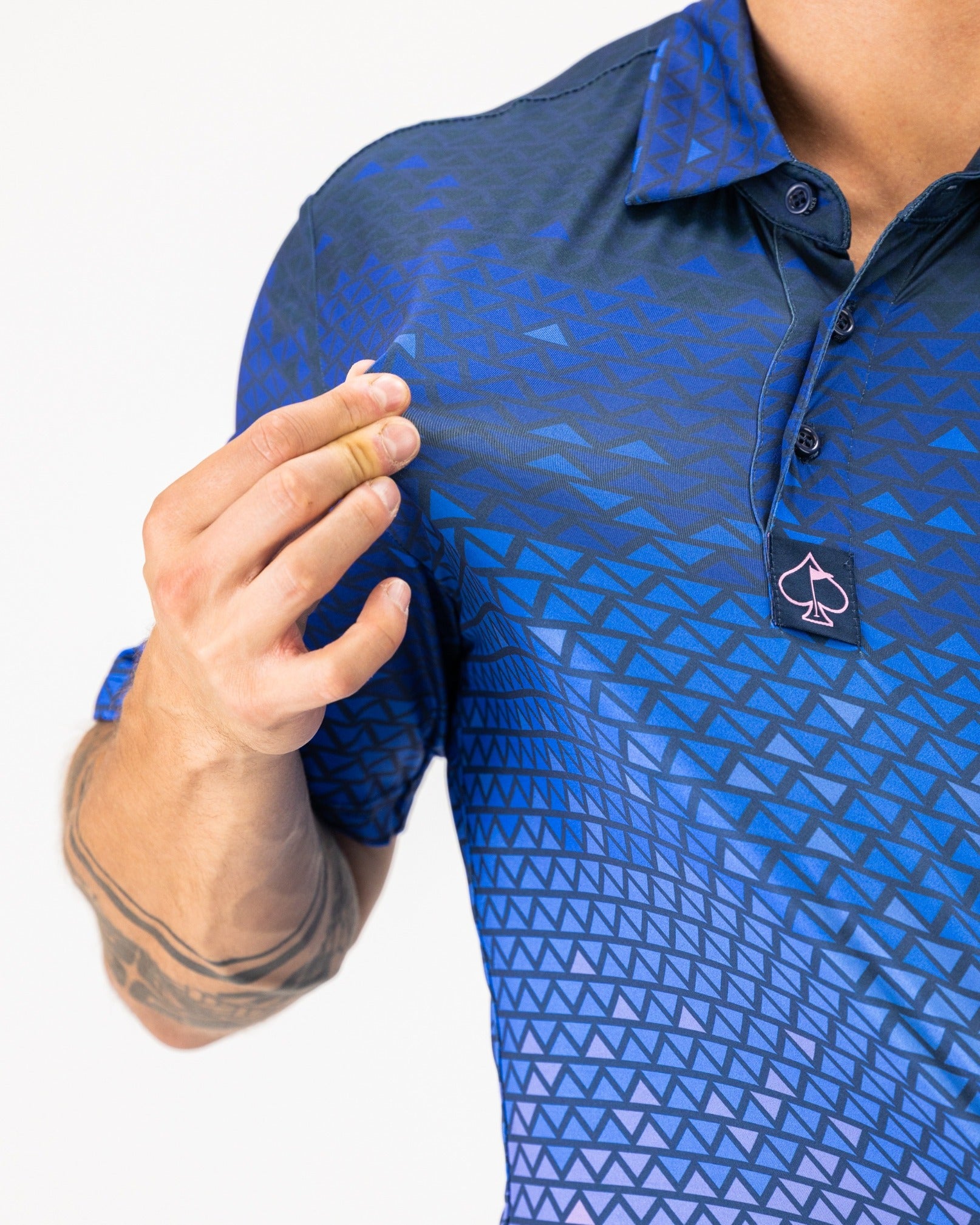Men's polo shirt featuring a digital rainfall pattern in blue tones, showcasing a modern design for stylish golfers.