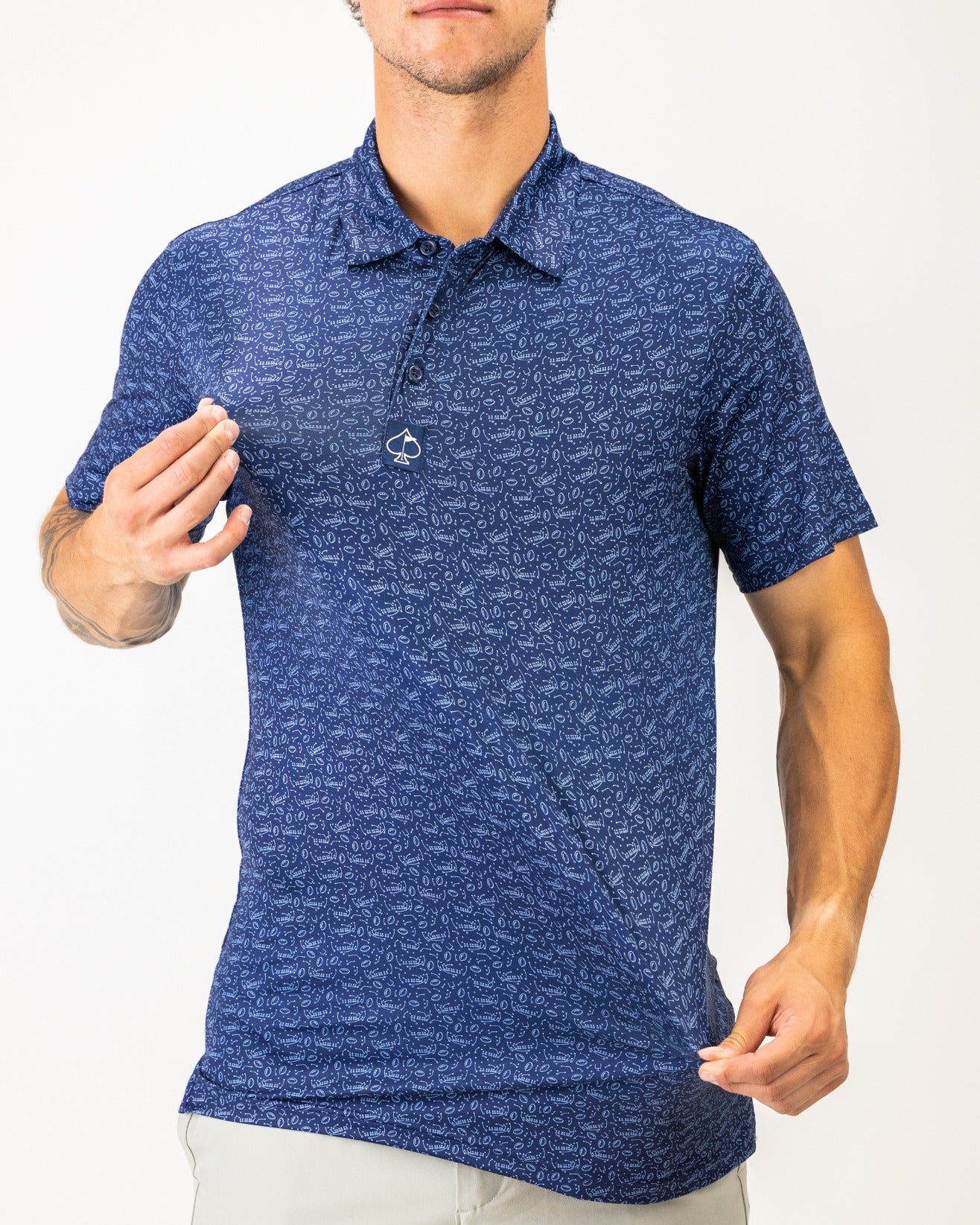 Men's Playmaker golf polo in navy with a unique pattern, showcasing a comfortable fit and stylish design for golfers.