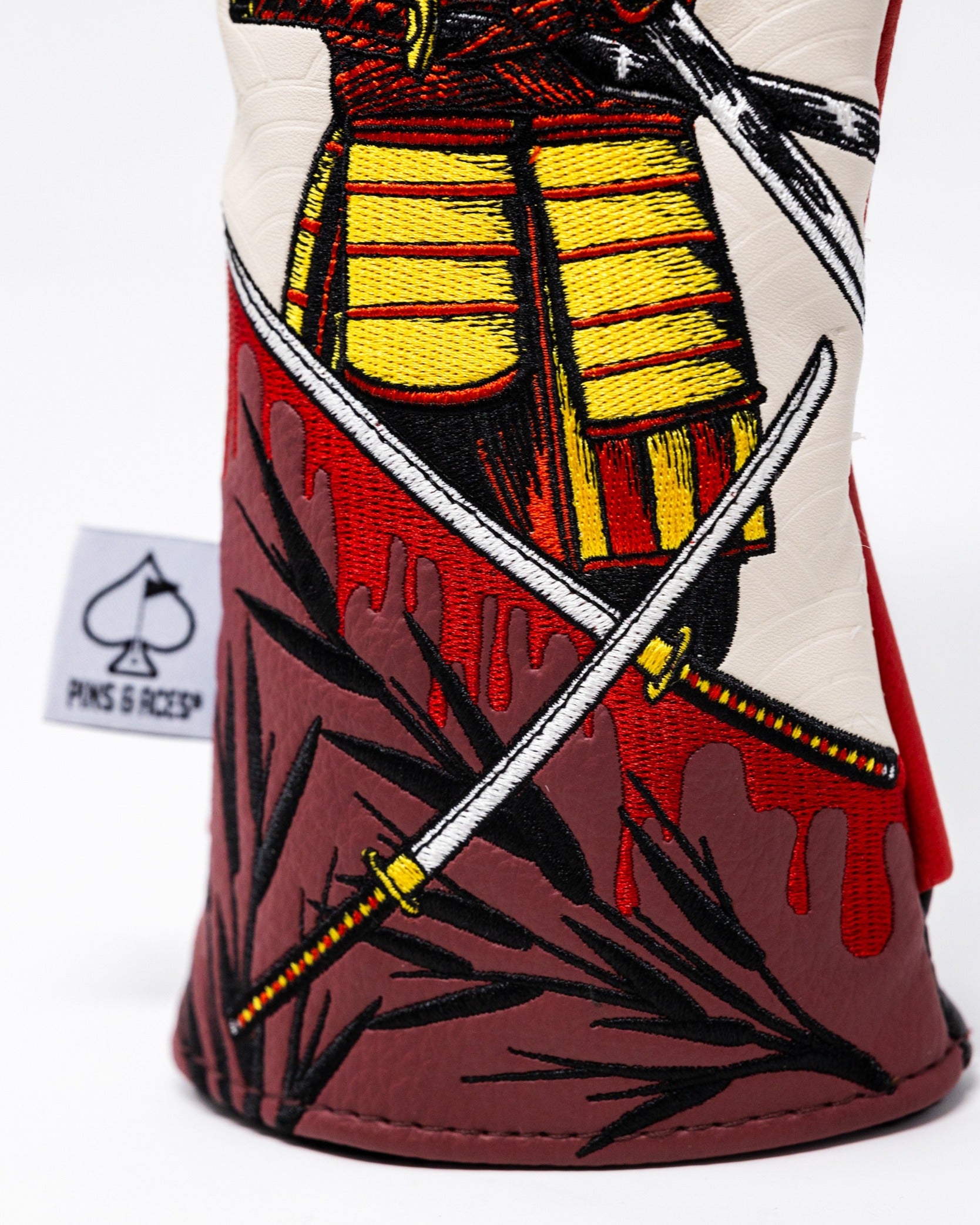 Bold hybrid golf cover featuring a detailed samurai design with swords and vibrant colors, perfect for standout style on the course.