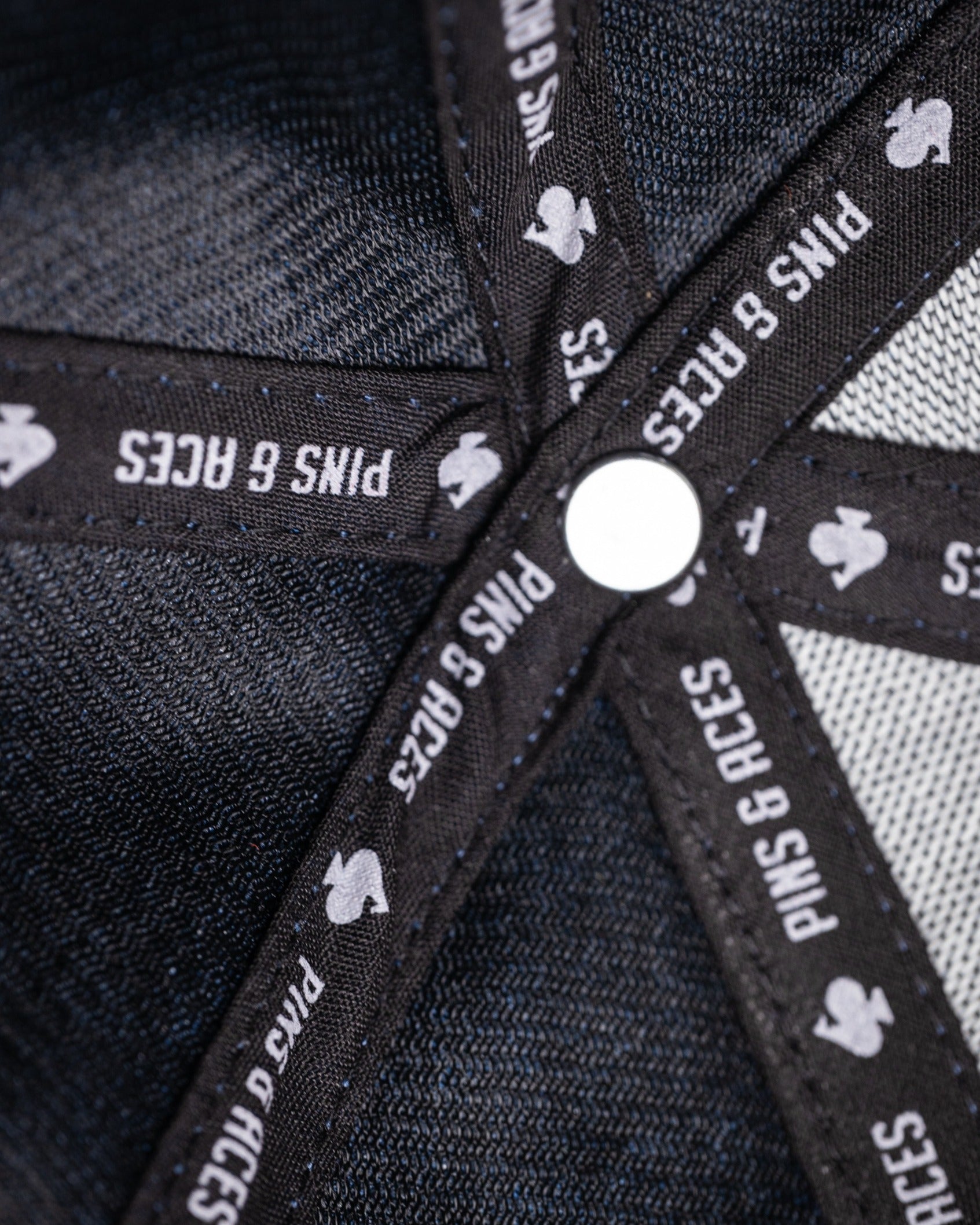 Charcoal Performance Spade Hat interior showing branded sweatband and mesh lining for comfort and breathability.