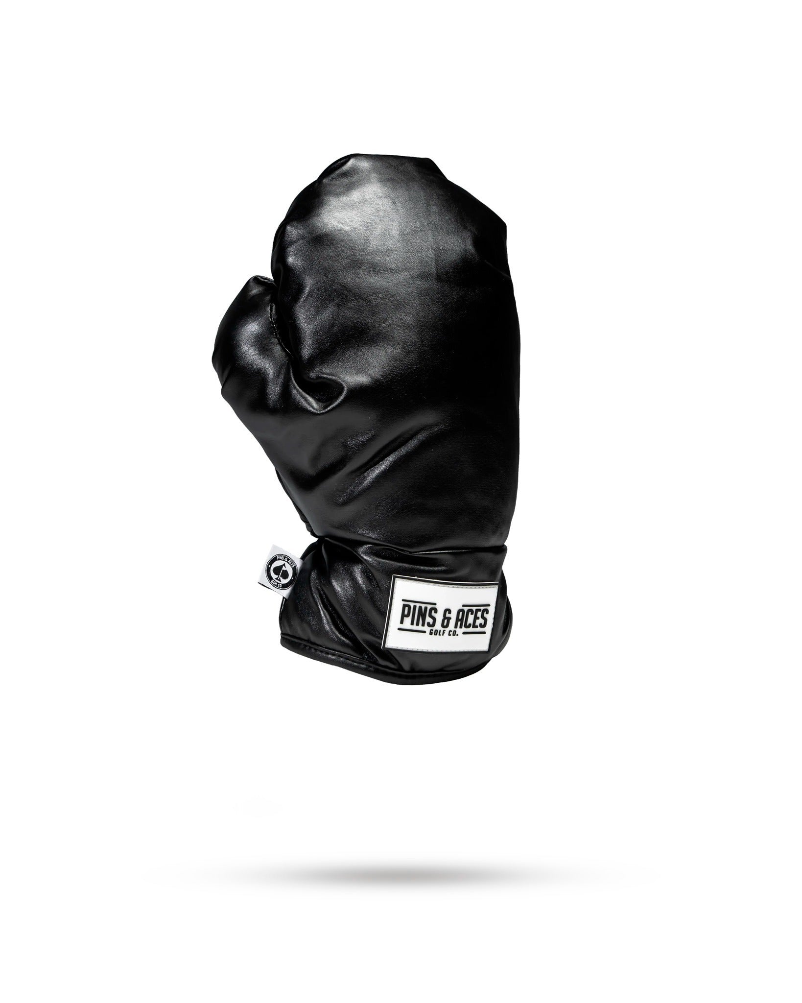 Black boxing glove fairway cover designed for golfers seeking a bold and unique accessory for their clubs.