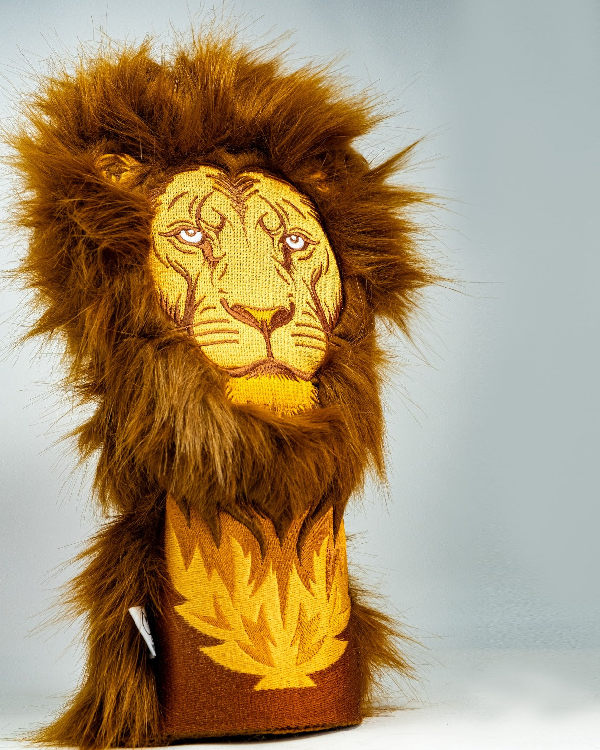Bold lion driver cover featuring a detailed lion face and a vibrant mane, perfect for golfers seeking unique style.