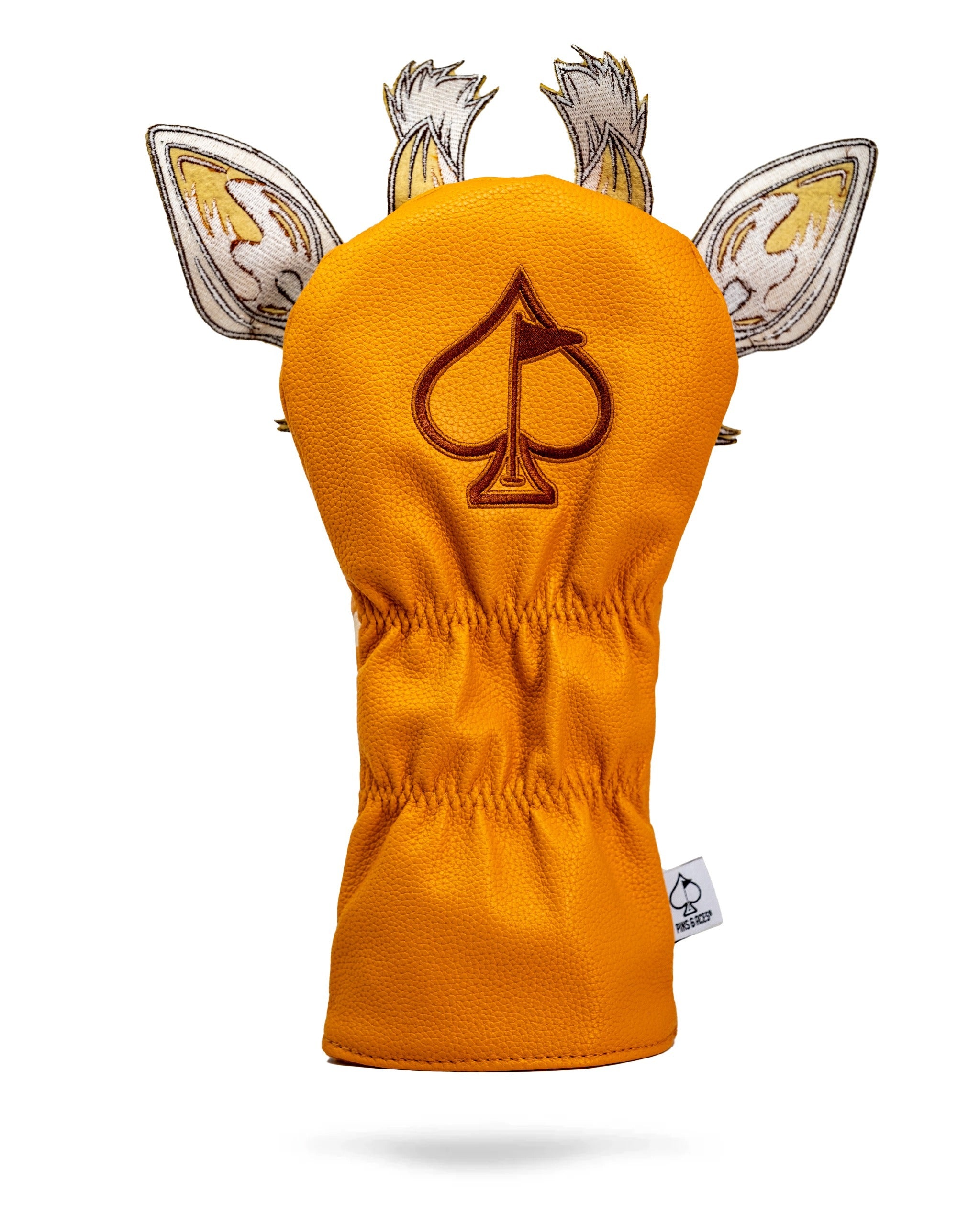 Giraffe driver cover in vibrant orange with detailed ears and a spade logo, designed for stylish golf protection.