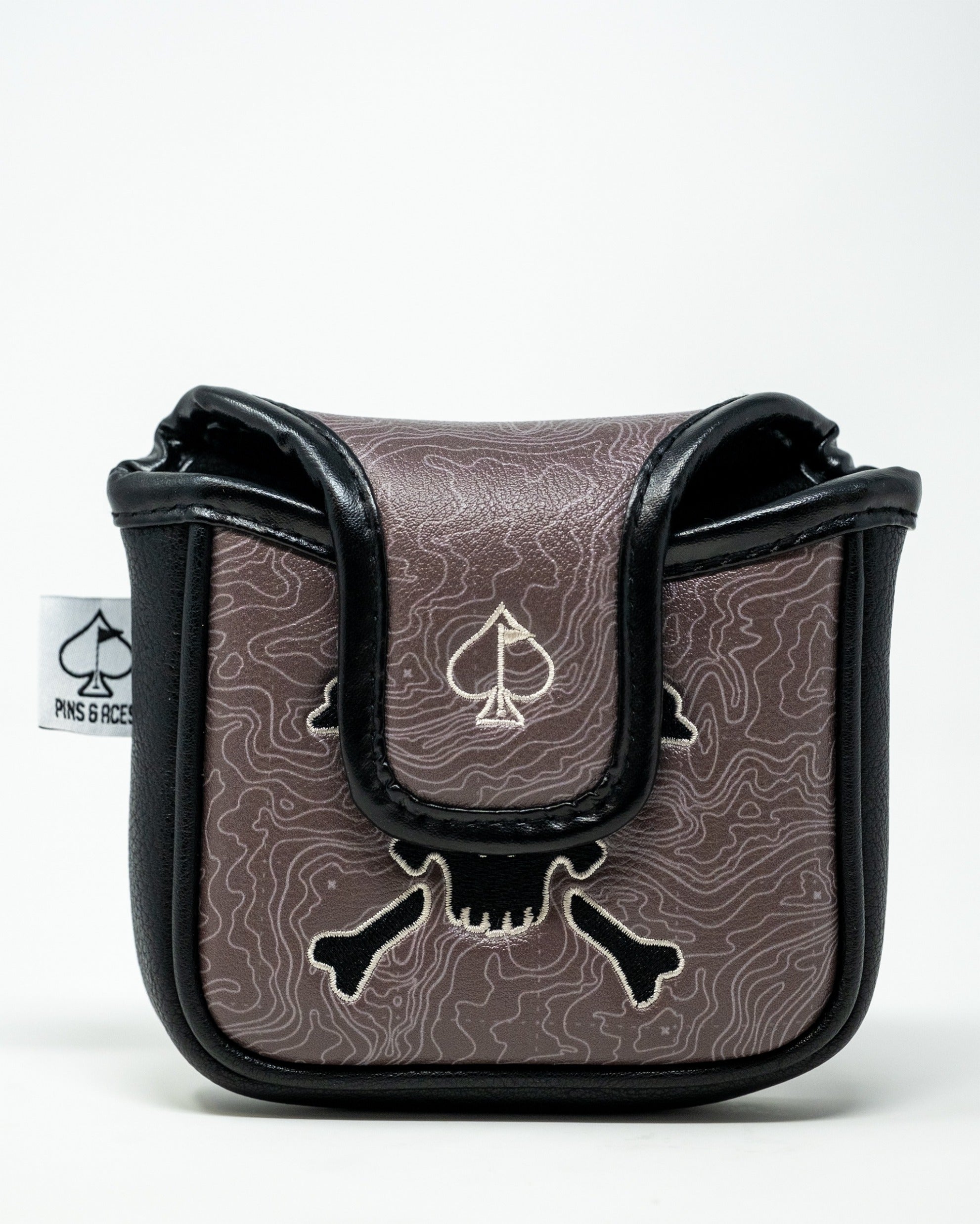 Bold mallet putter cover featuring a pirate skull and crossbones design, perfect for golfers who want to stand out.