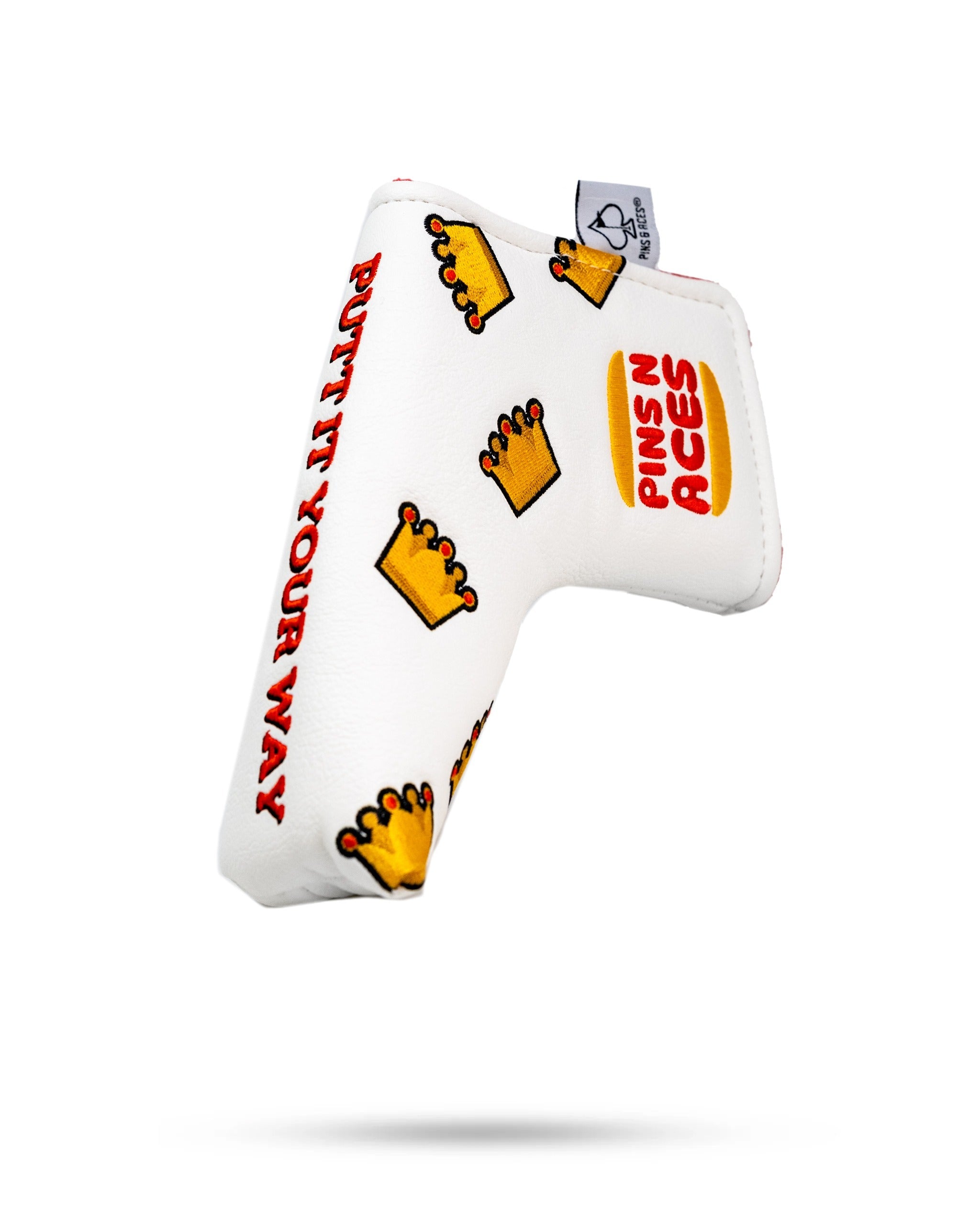 White blade putter cover featuring a crown design and "Put It Your Way" text, ideal for bold golfers.