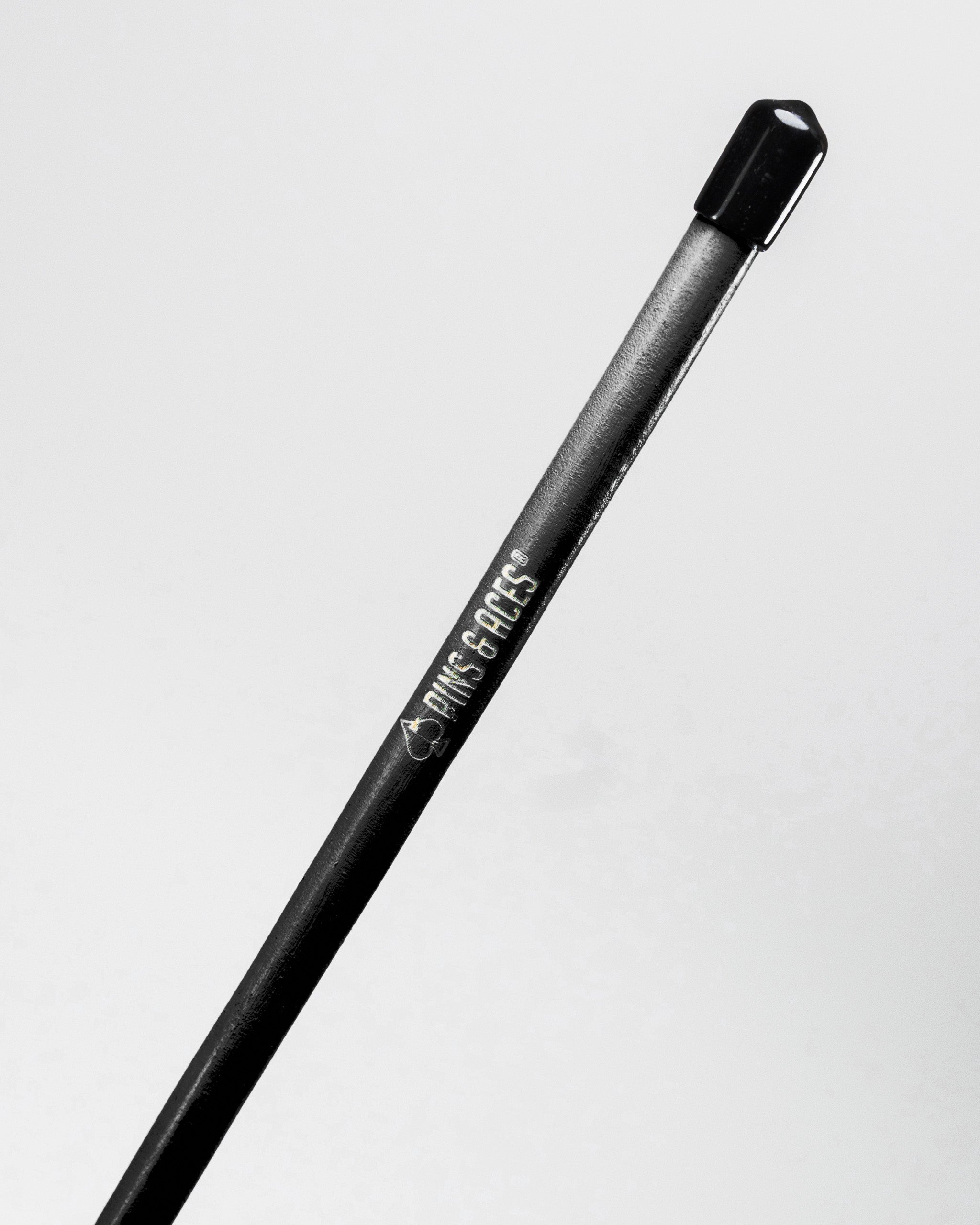 Black Pins Alignment Sticks set of two, designed for golfers to improve their alignment and accuracy on the course.