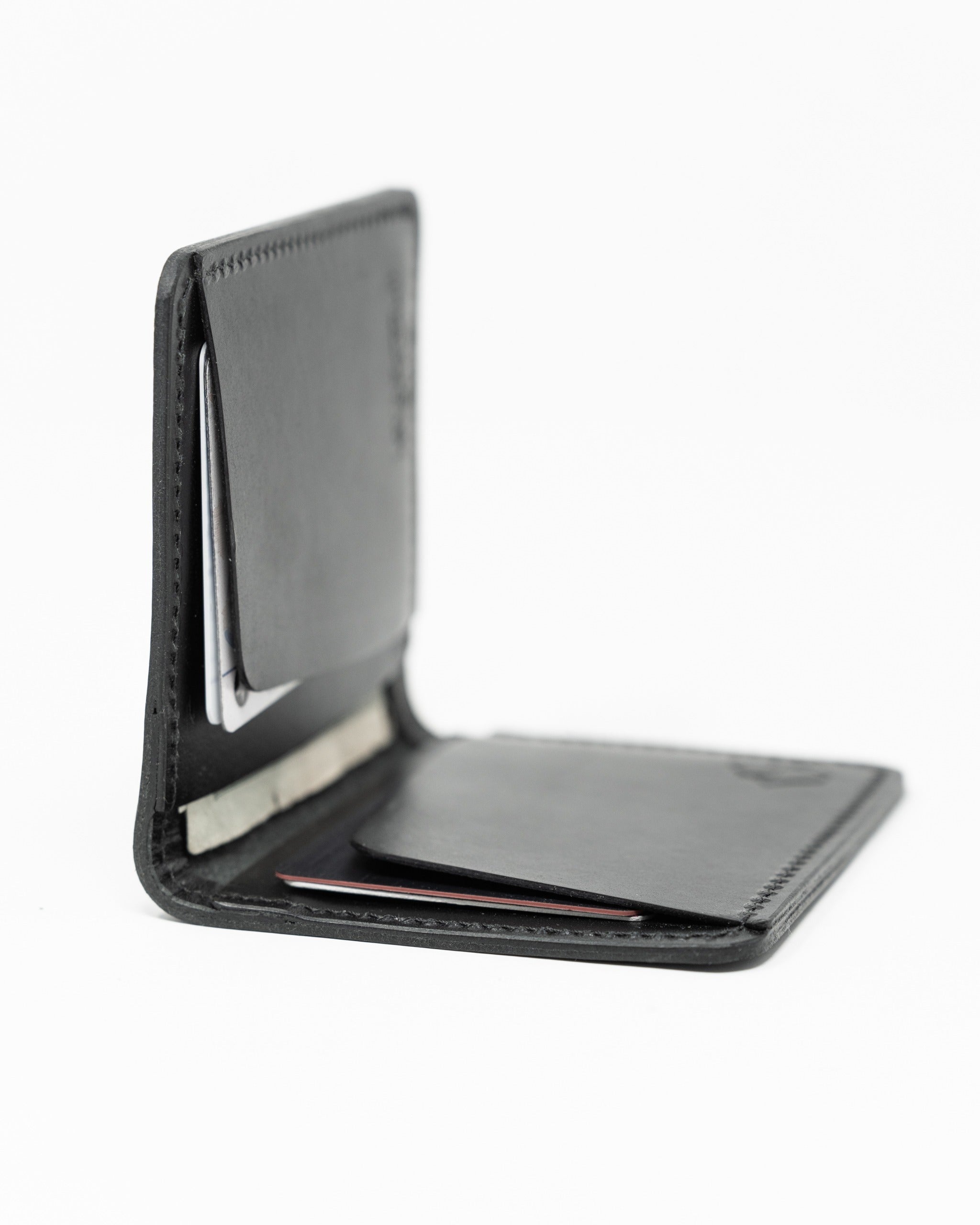 Sleek Italian black wallet featuring multiple card slots and a smooth finish, ideal for stylish organization.