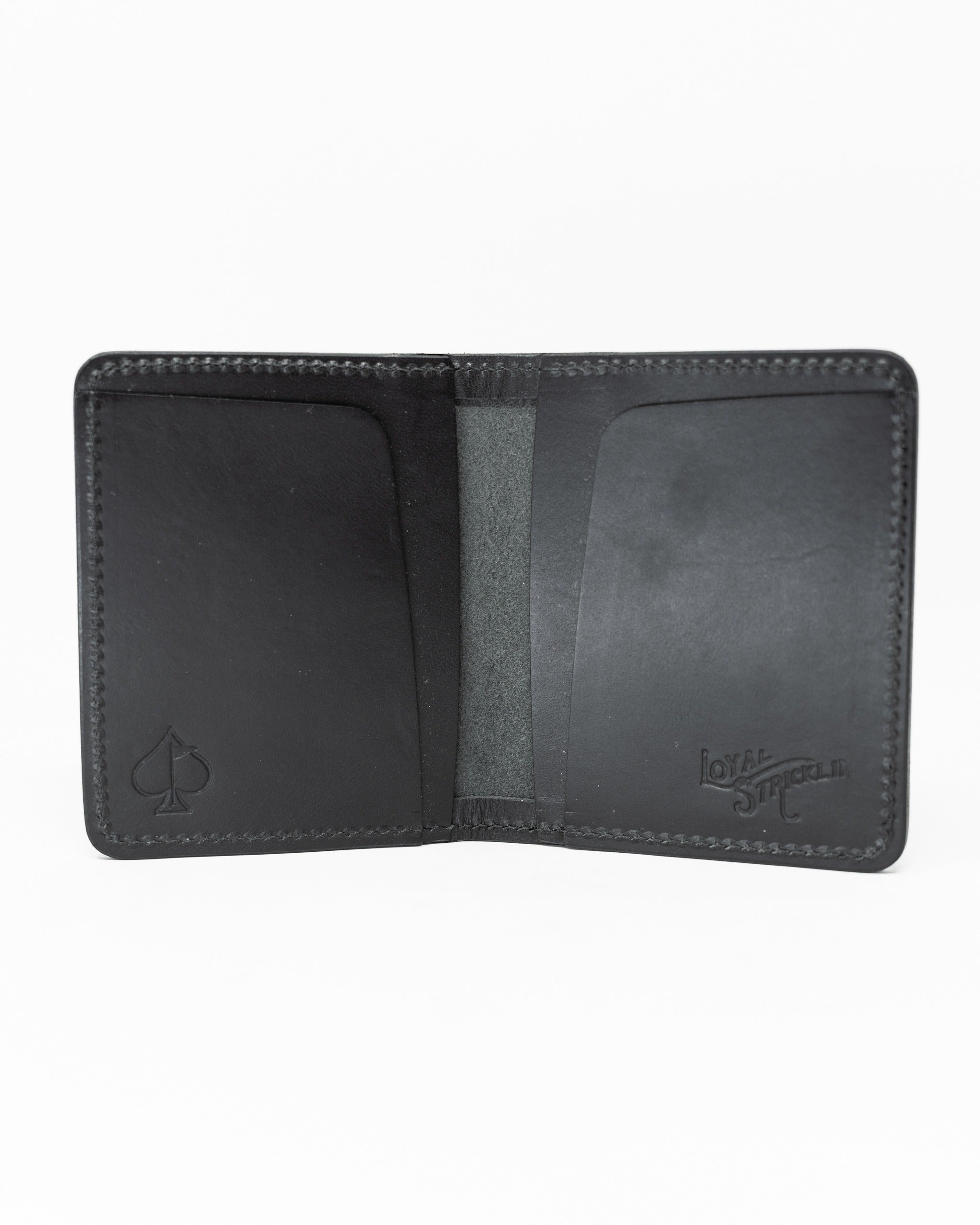 Sleek black Italian leather wallet with a smooth finish and minimalist design, featuring card slots and embossed logo.