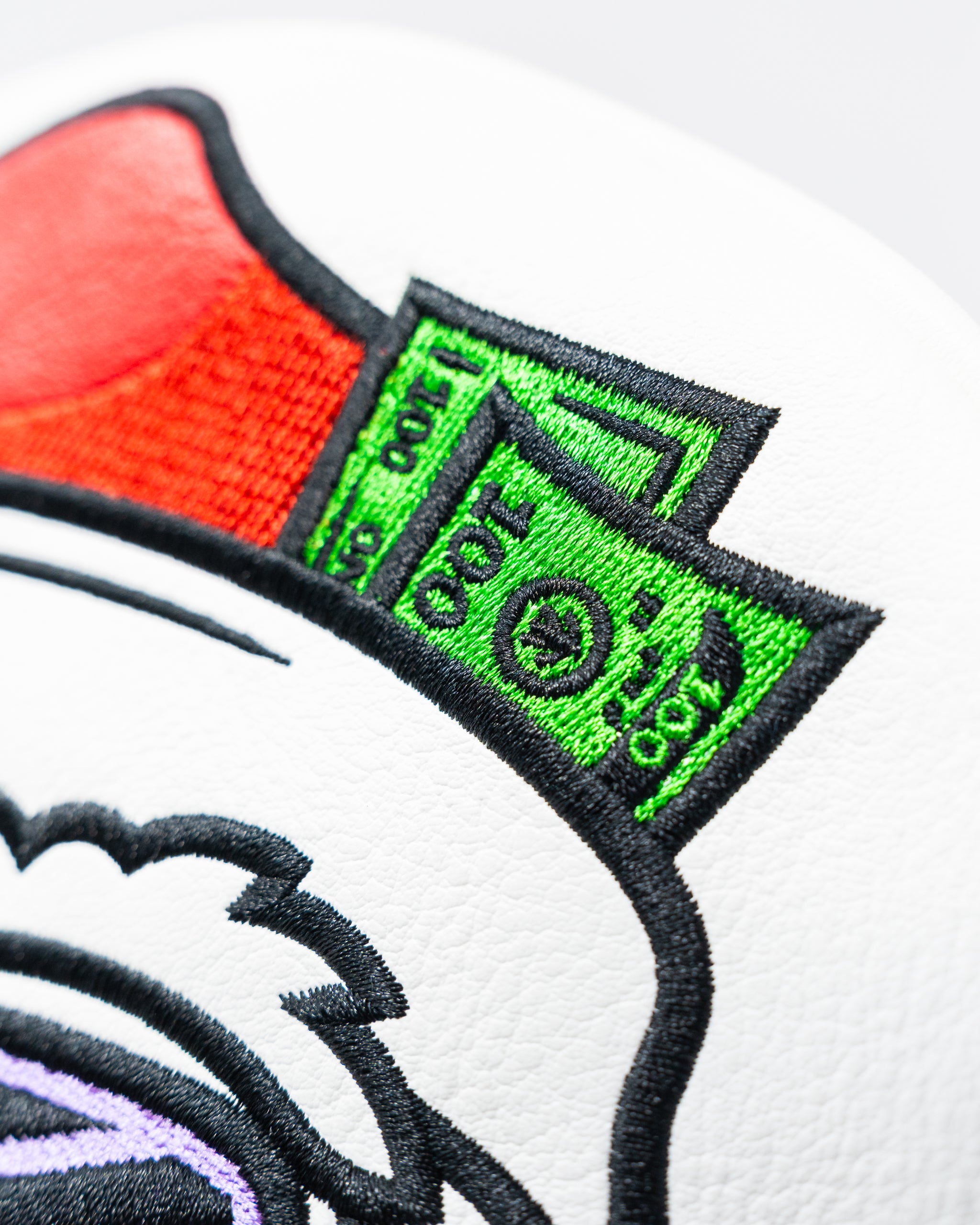 Santa Degenerate driver cover featuring a playful Santa design with dollar bills, perfect for bold golfers.