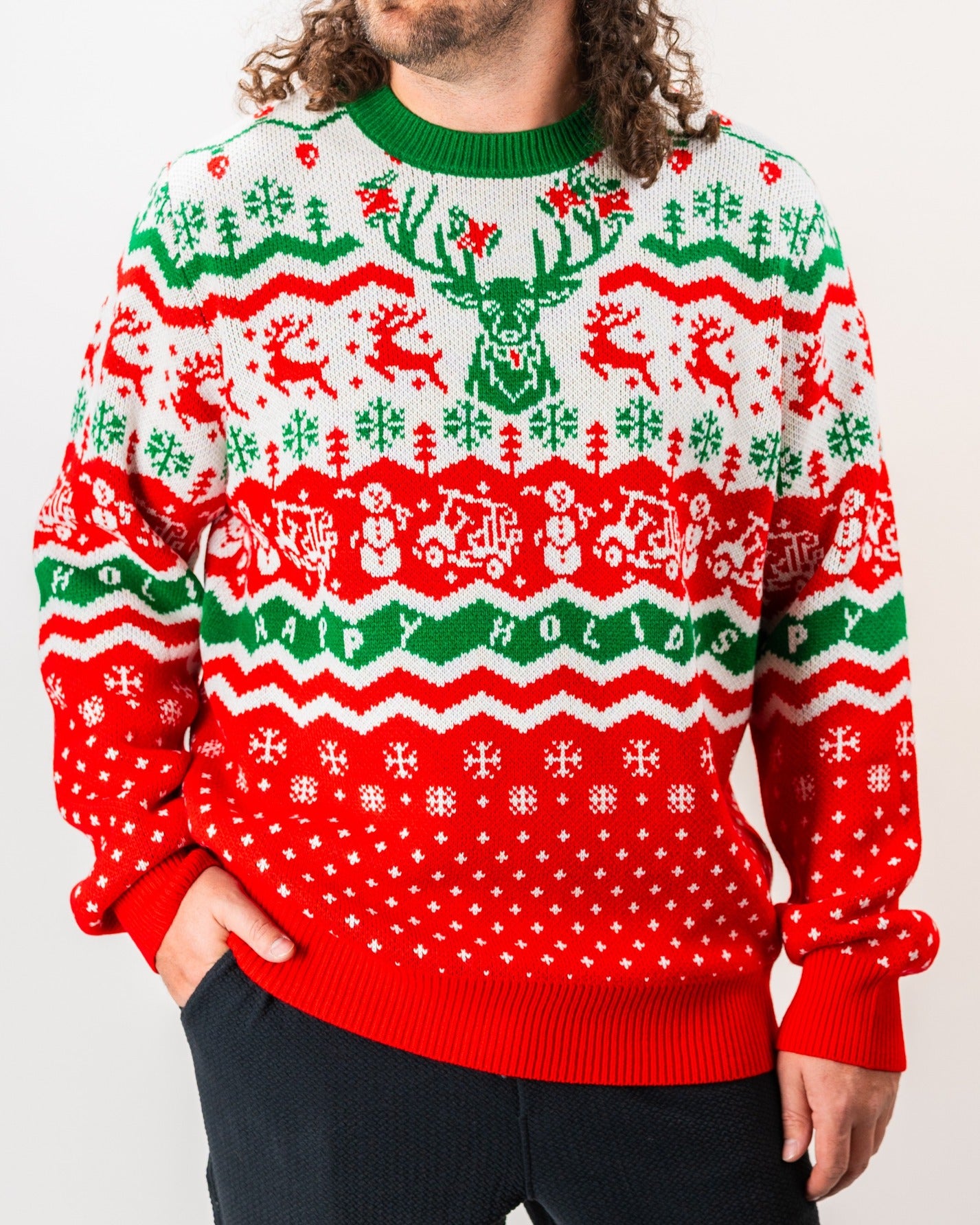 Bold red and green ugly sweater featuring festive patterns, reindeer, and snowflakes, perfect for holiday golf outings.