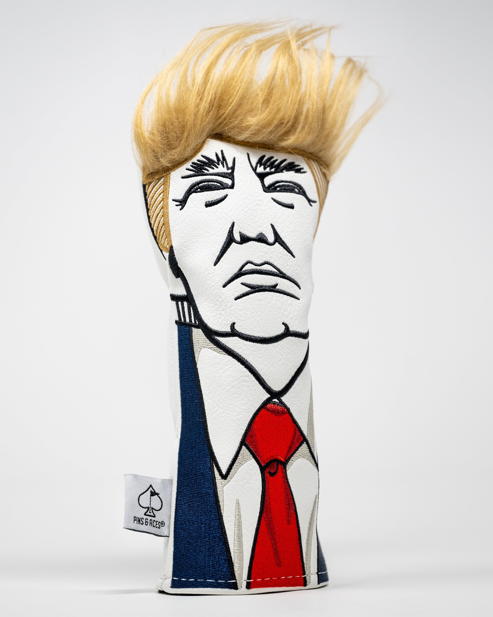 Bold golf hybrid cover featuring a caricature of a businessman with distinctive hair and suit details, perfect for unique style on the course.