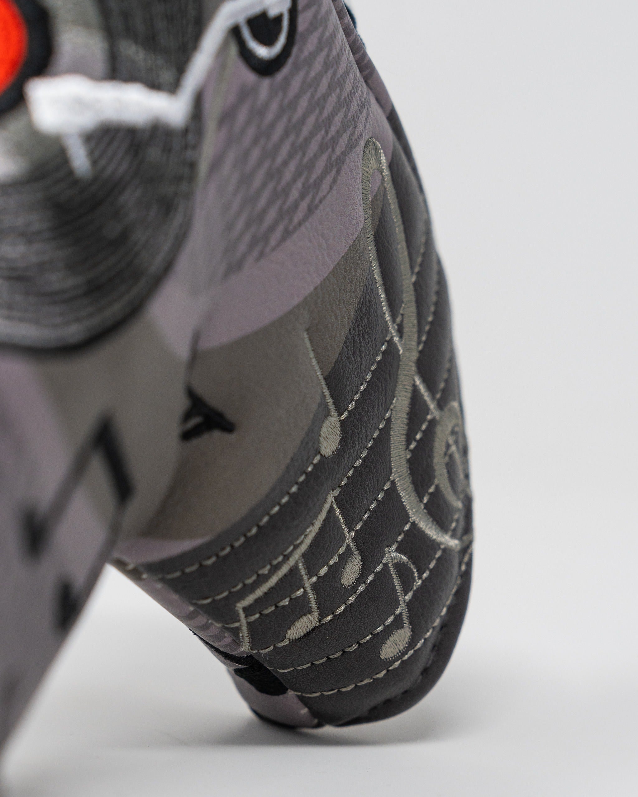 Music City blade putter cover featuring a vibrant design with musical notes and a vinyl record motif.