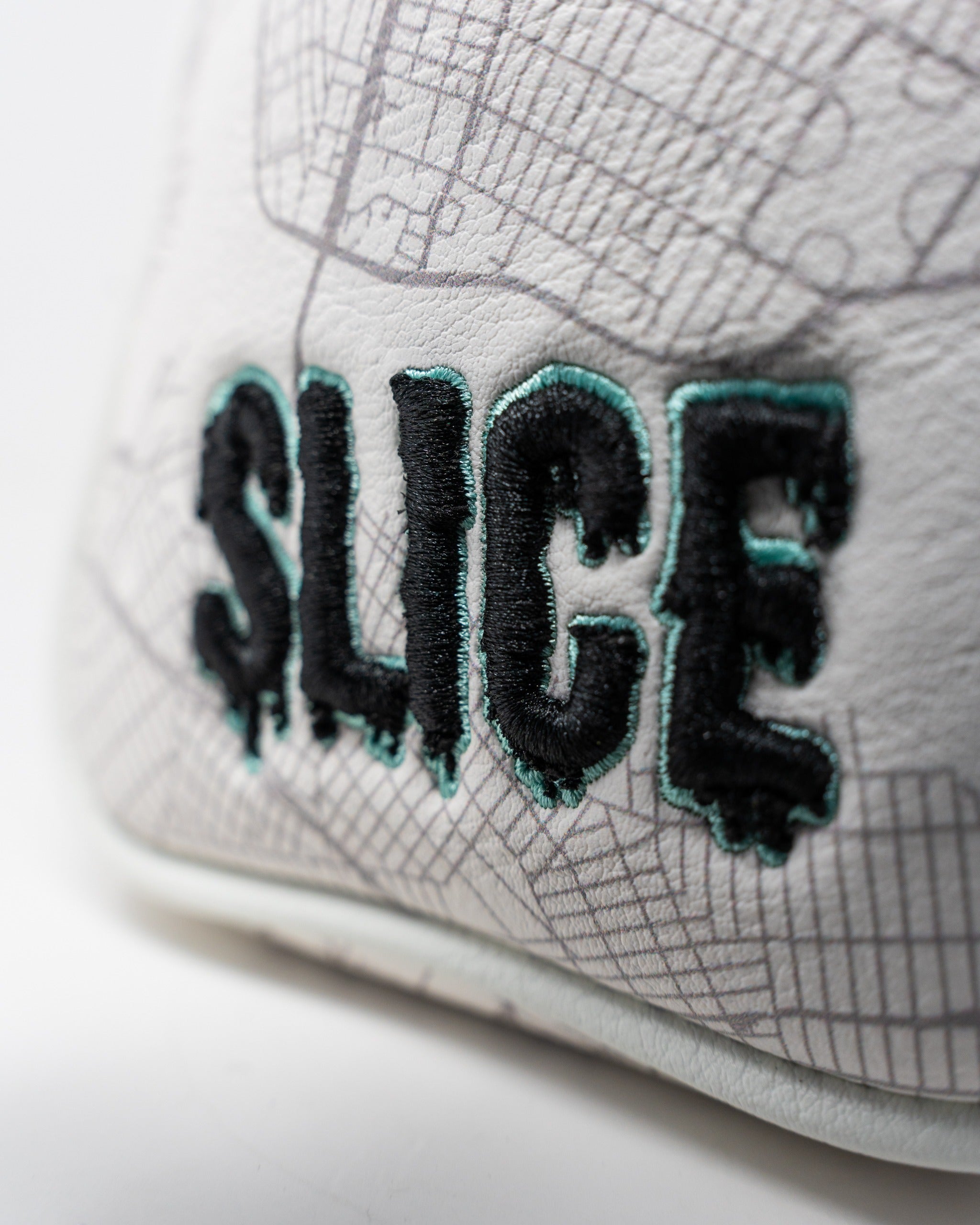 Bold Shady Slice mallet cover featuring a unique design and embroidered "SLICE" text for stylish golf protection.