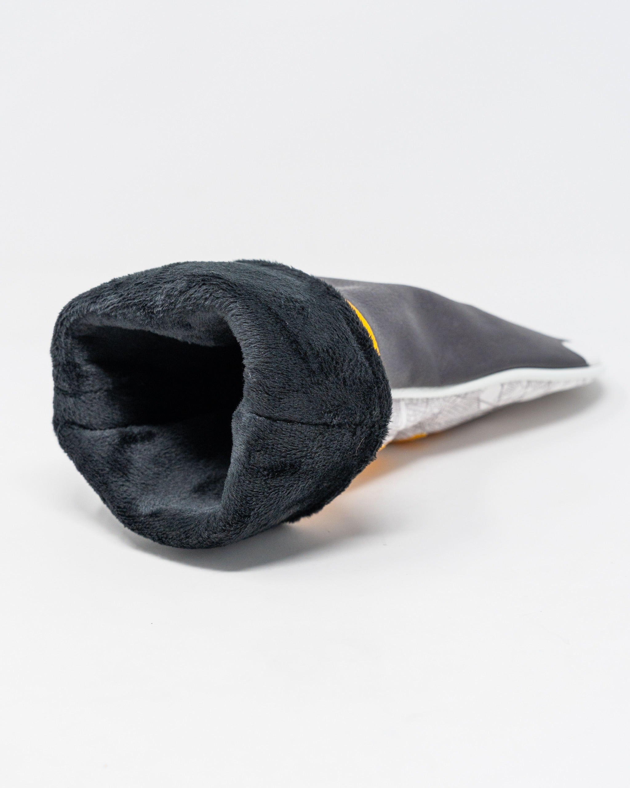 Black and yellow Whiz Wit fairway cover with a soft, plush interior, designed to protect golf clubs in style.