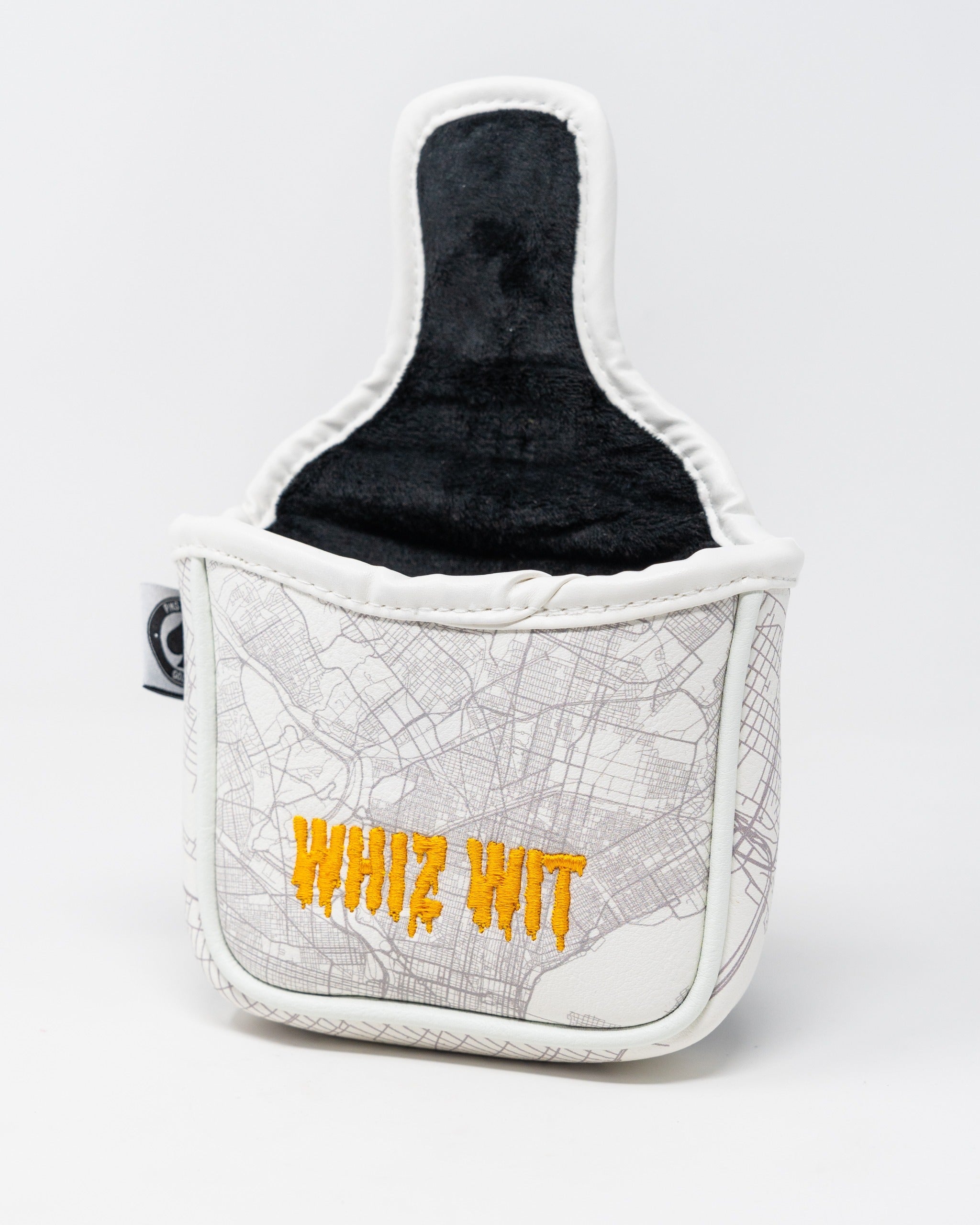 Whiz Wit mallet cover featuring a city map design with bold orange lettering on a white background.