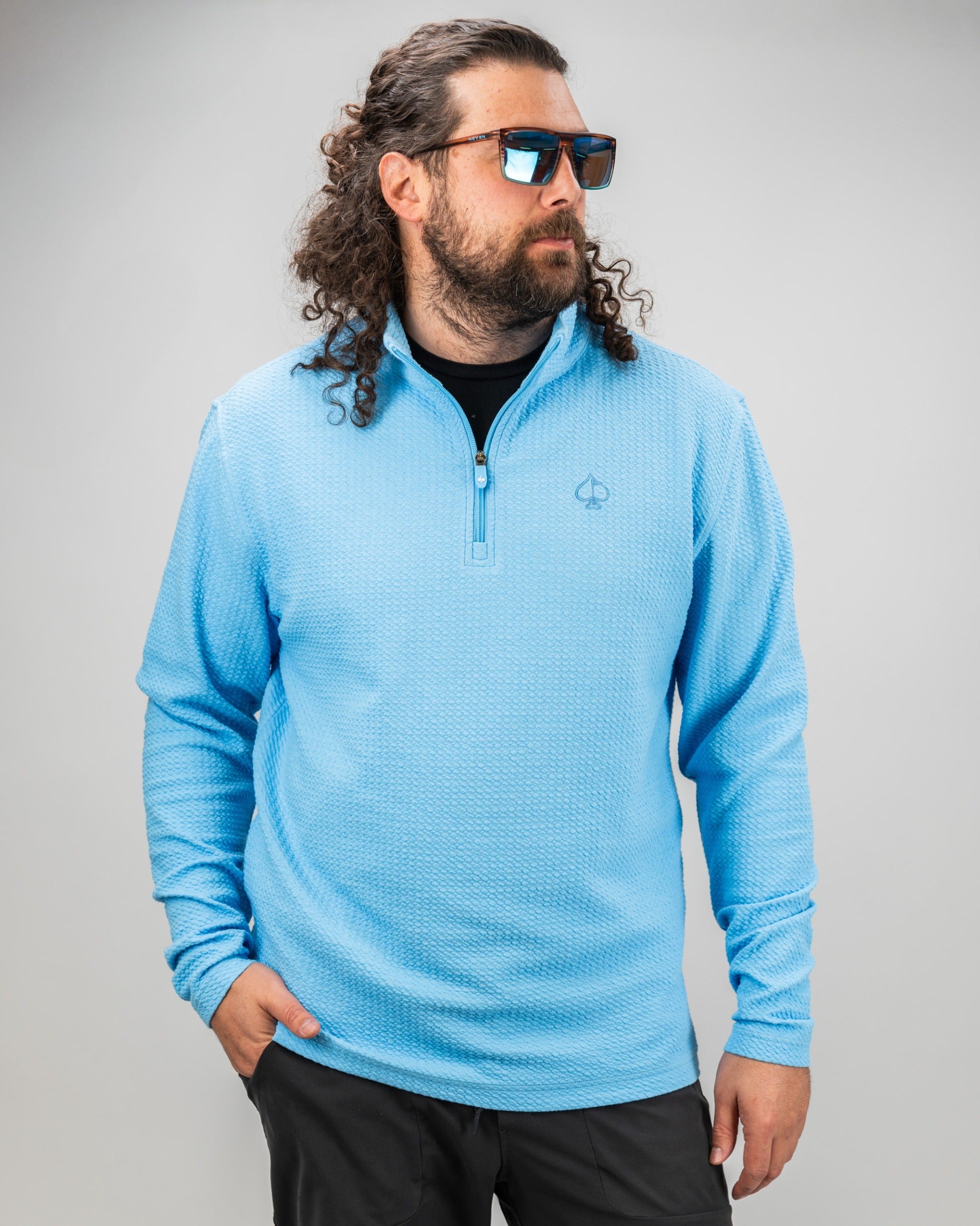 Blue Steel Player Preferred Waffle Knit Pullover features a half-zip design, perfect for stylish comfort on the golf course.